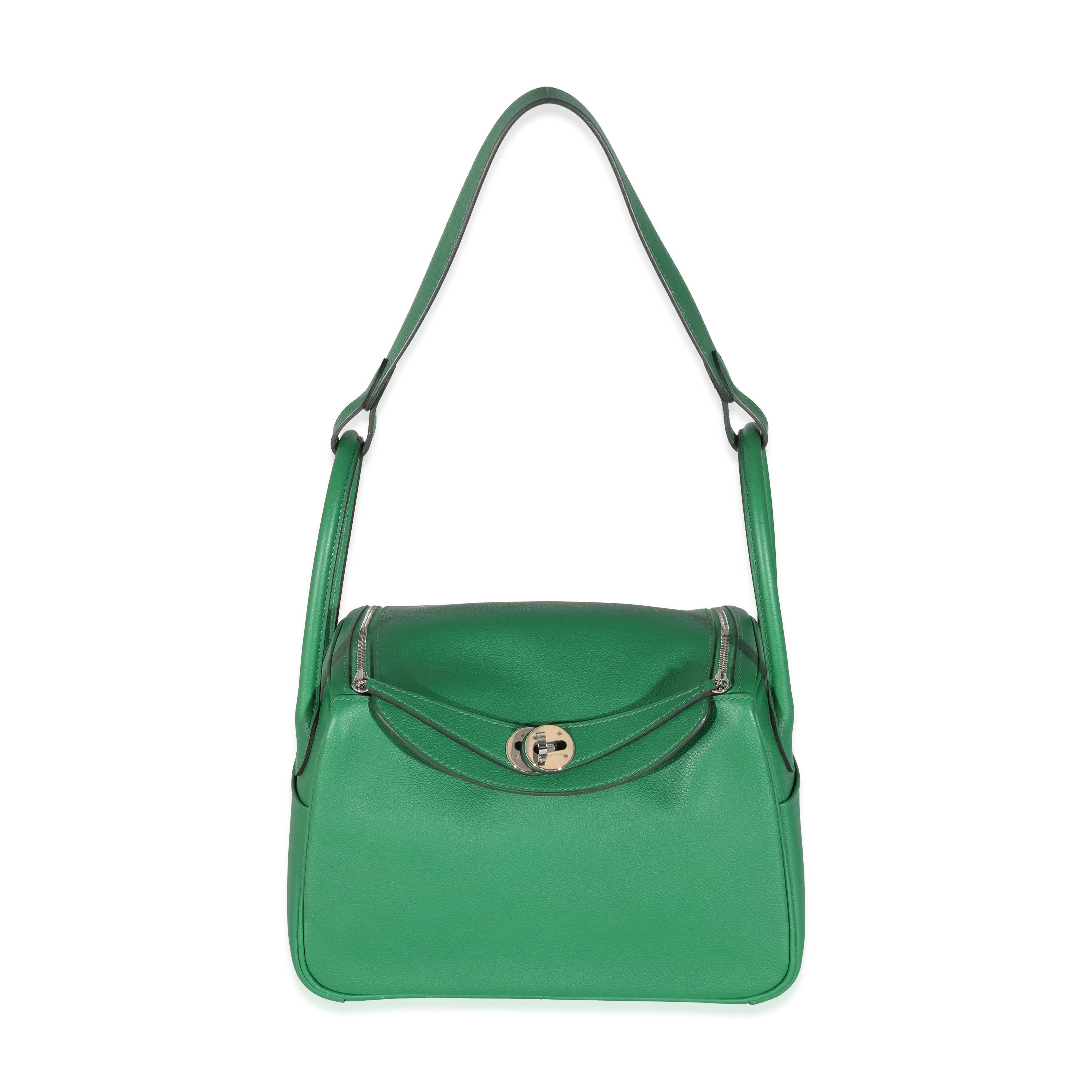 Listing Title: Hermes Cactus Evercolor Lindy 26 PHW
SKU: 131754
Condition: Pre-owned 
Handbag Condition: Excellent
Condition Comments: Item is in excellent condition and displays light signs of wear. plastic along hardware. Scratching to