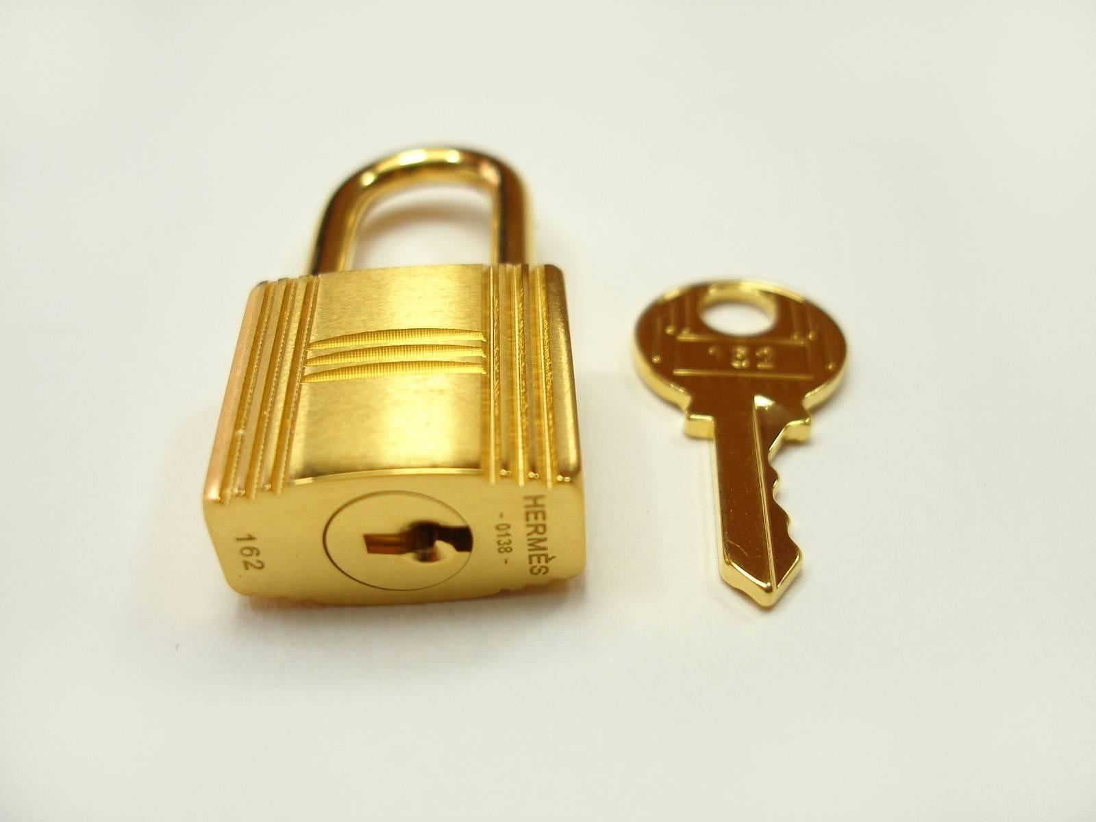 Hermès Cadenas Lock 2 Keys For Birkin or Kelly bag Gold plated shiny and brushed 9