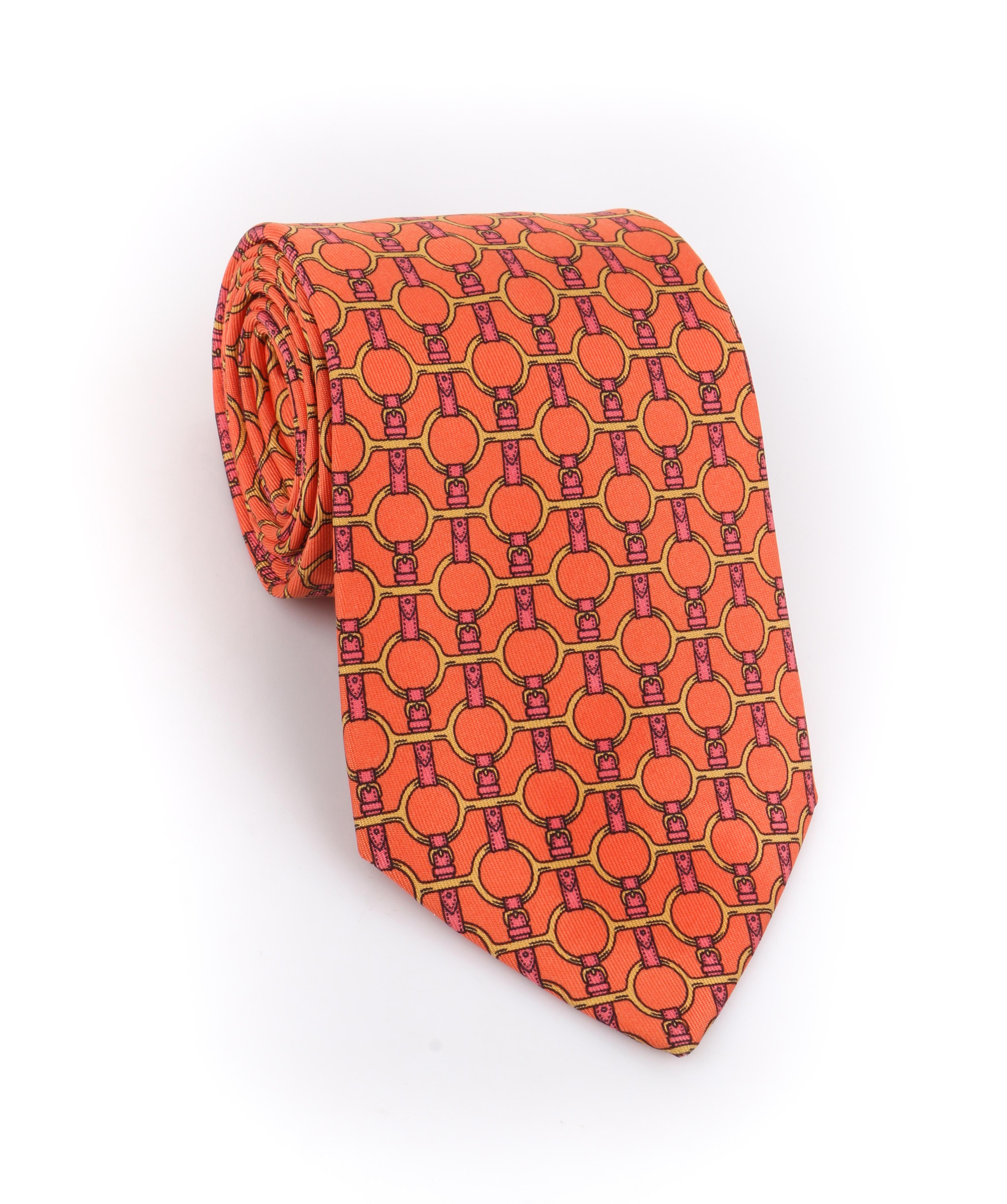DESCRIPTION: HERMES Cadmium Orange Horsebit Belt Equestrian 5 Fold Silk Necktie Tie 627 TA
 
Brand / Manufacturer: Hermes
Collection: 
Designer: 
Manufacturer Style Name: 
Style: 5 fold necktie
Color(s): 
Lined: Yes
Marked Fabric Content: 100%