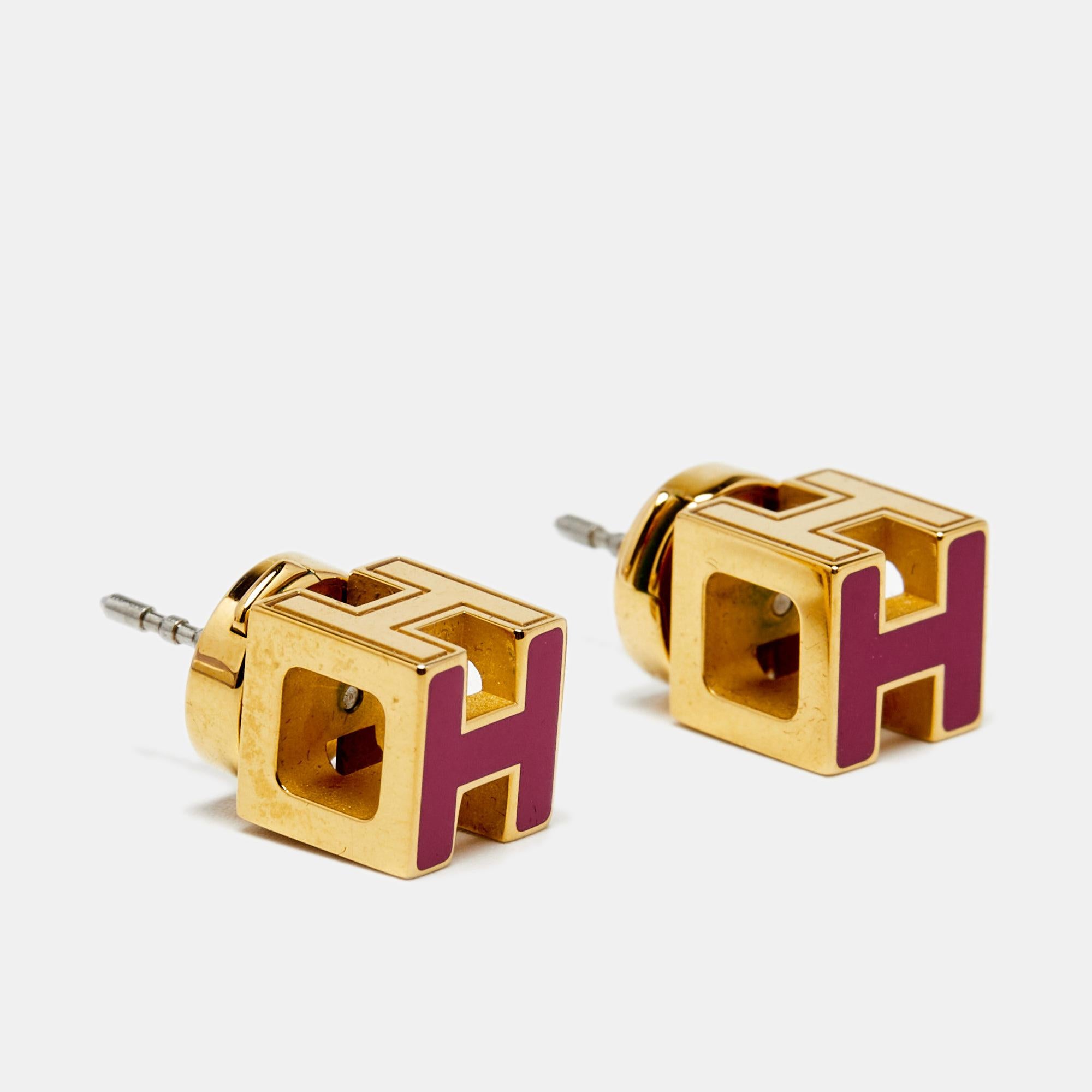 Stud earrings are an ideal pick for an effortless enhancement over any kind of ensemble. These Cage d'H studs by Hermés are just the right accessory to match up with any formal or casual wear. Sculpted in gold-plated metal, they feature the brand's