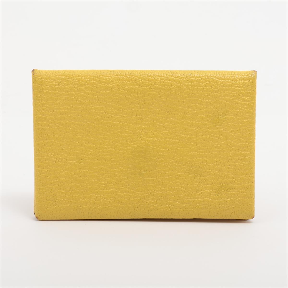 The Hermès Calvi Card Holder in Limoncello is a chic and vibrant accessory that exudes luxury and style. Crafted from high-quality Epsom leather, known for its durability and distinctive texture, the card holder features a striking Limoncello hue