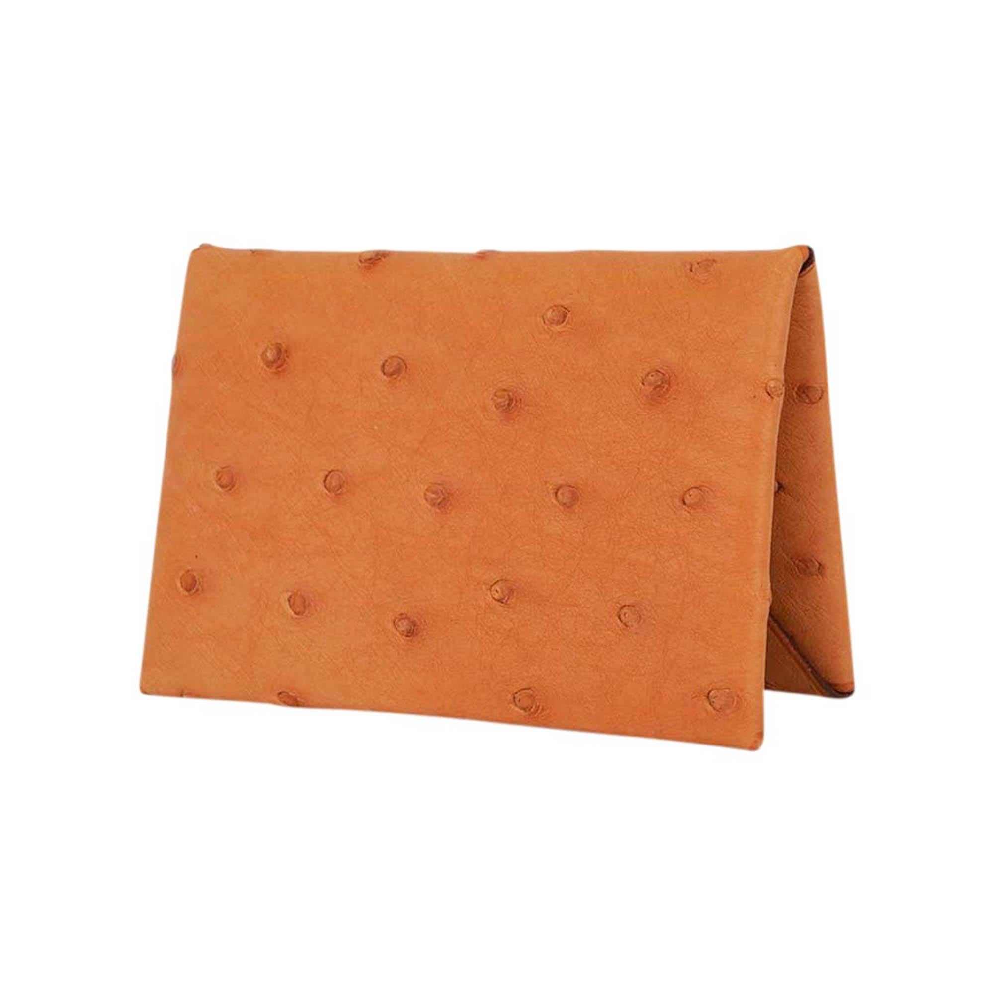 Mightychic offers an Hermes Calvi card holder featured in rare Saffron Ostrich
Palladium snap closure.
The card holder has 2 slots for business / credit cards.
Comes with signature Hermes box.
New or Store Fresh Condition.
final sale

CARD HOLDER