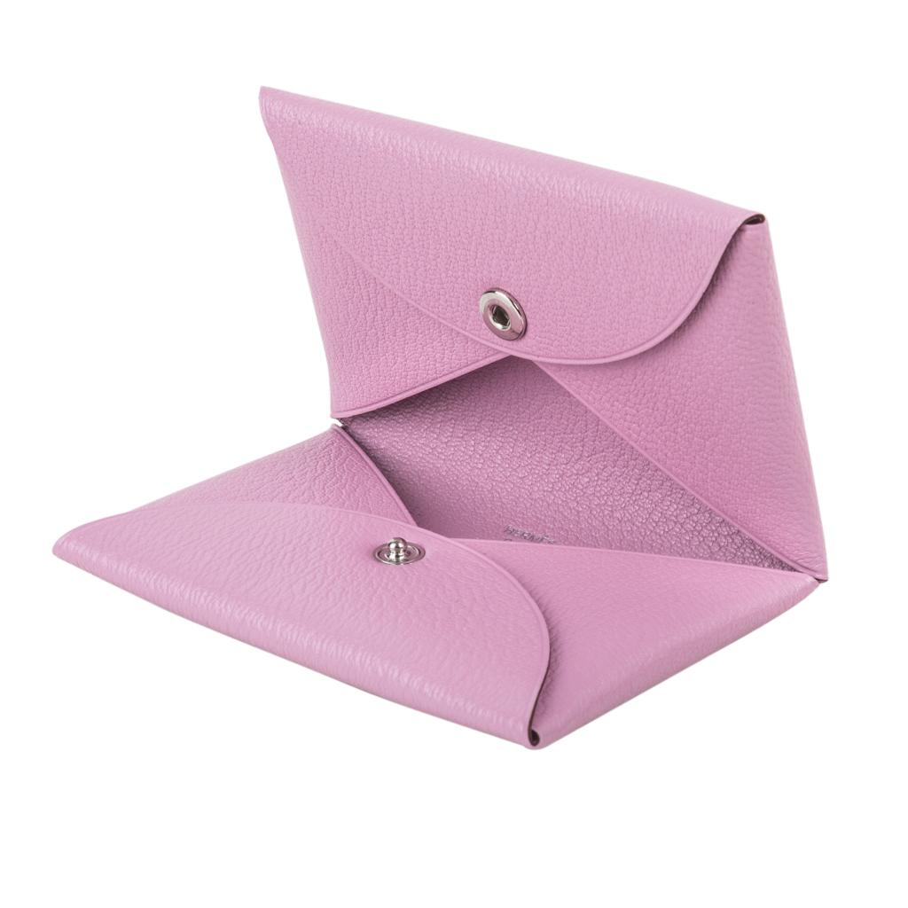 Mightychic offers an Hermes Calvi card holder featured in Mauve Sylvestre.
This clever card holder, created from simple folds of the leather - also serves as a small wallet for your evening bag!
Mysore Chevre leather. 
2 credit card slots for
