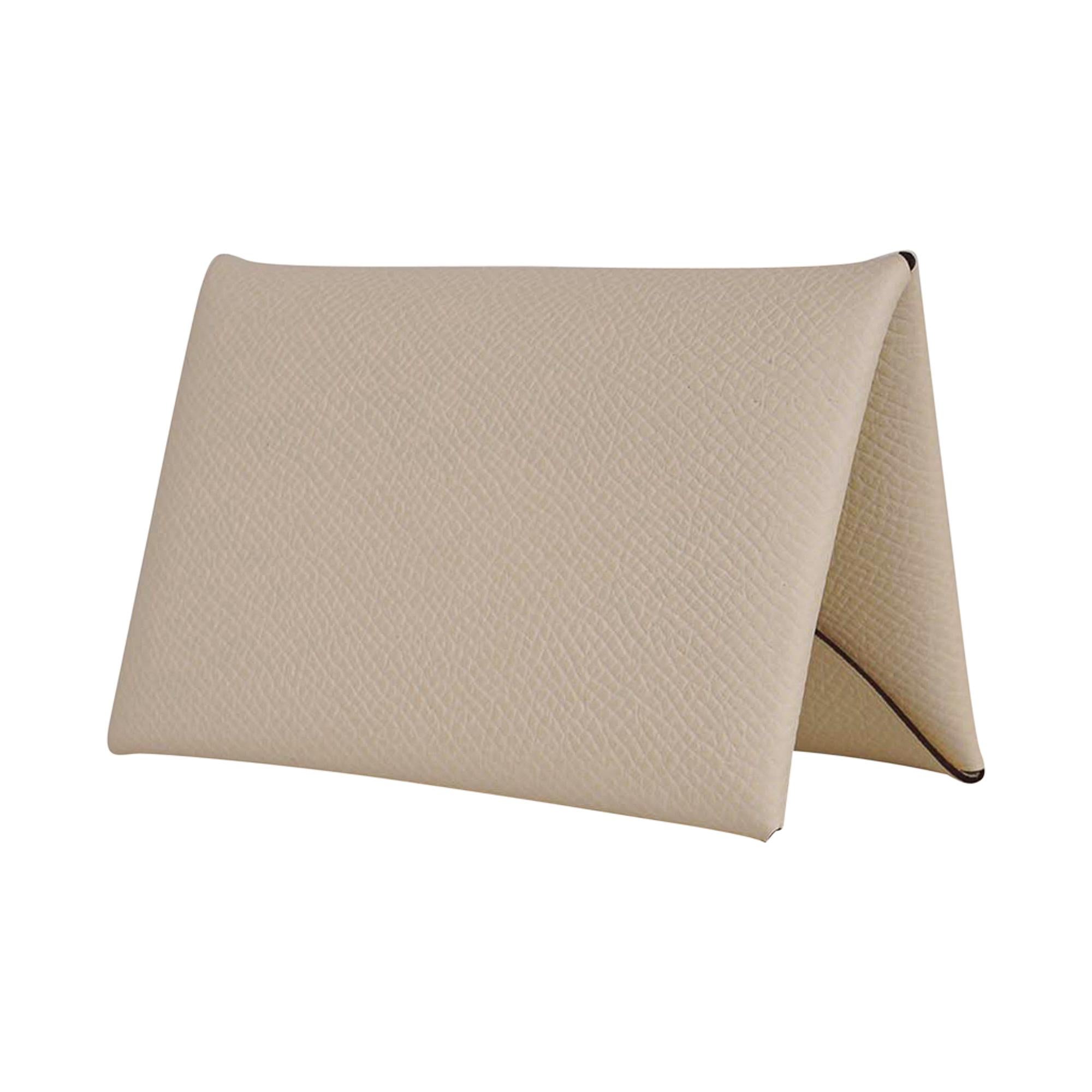 Mightychic offers a guaranteed authentic Hermes Calvi card holder featured in Nata
Epsom leather with palladium snap closure.
The card holder has 2 slots for business/credit cards.
Comes with signature Hermes box.
New or Store Fresh Condition.
final