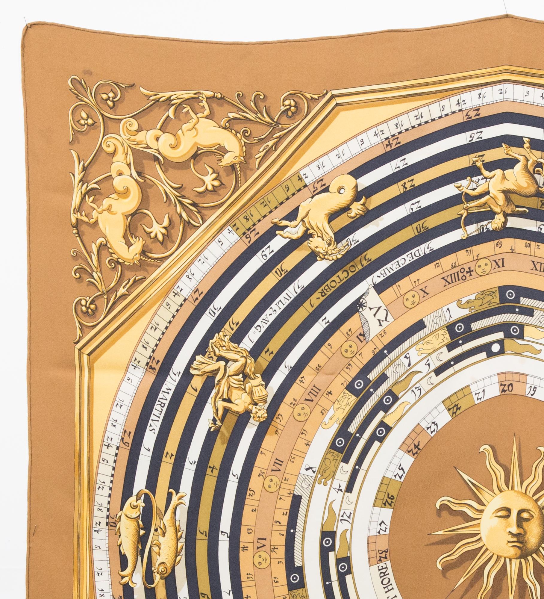 Hermes silk scarf camel  “Dies et Hore” (Astrology) by Francoise Faconnet featuring sun, moon Astrology & Renaissance scene, a camel border and a Hermès signature.   
Circa 1988s 
In good vintage condition. Made in France.
35,4in. (90cm)  X 35,4in.