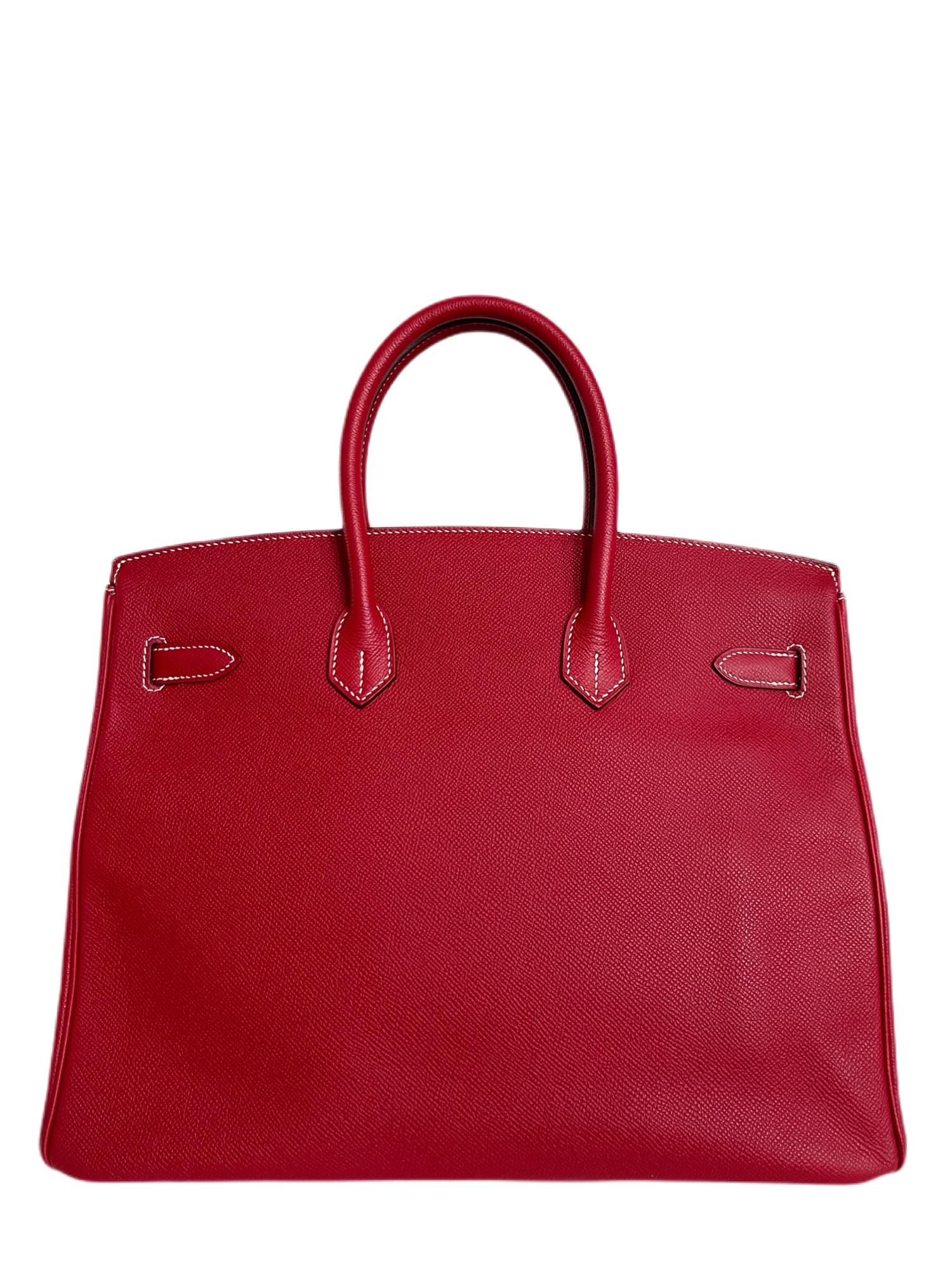 This authentic Hermes Candy Rouge Epsom 35 cm Birkin is in pristine unworn condition.  The protective plastic remains intact on the Permabrass hardware.
Durable and textured Epsom leather absorbs this breathtaking shade of deep berry beautifully. 