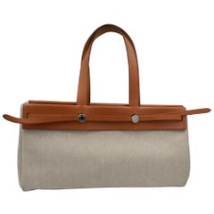 Hermes  Canvas and Natural Leather Herbag