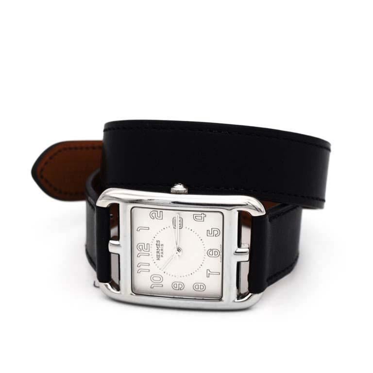HERMES CAPE COD STAINLESS STEEL WATCH CC2.710

Mint Condition
Stainless Steel
Case size: 28x40mm
Movement: Quartz
Arabic numerals
Date indicator
Black leather strap
Closure: Double wrap around with buckle and notch closure

Watch only. No box & no