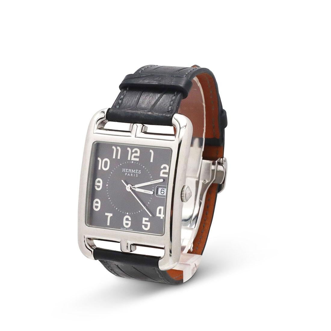 Authentic Hermès Cape Cod ladies watch crafted in stainless steel.  The case measures 33mm x 33mm, 46mm lug to lug.  Sunray slate dial, with Arabic numerals and date at 3 o'clock.  Interchangeable croc-embossed black leather strap with stainless