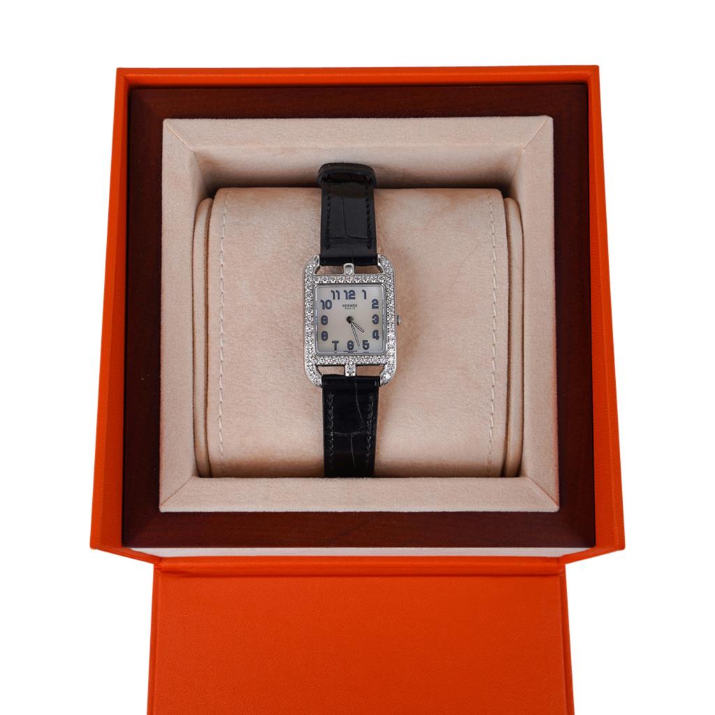 Guaranteed authentic Hermes Diamond Cape Cod watch.
The watch has 50 brilliant bead set diamonds for a total carat weight of 1.25.
The 23 mm x 23 mm watch has an opaline silvered dial.
Shiny black Alligator skin strap.
Quartz movement made in