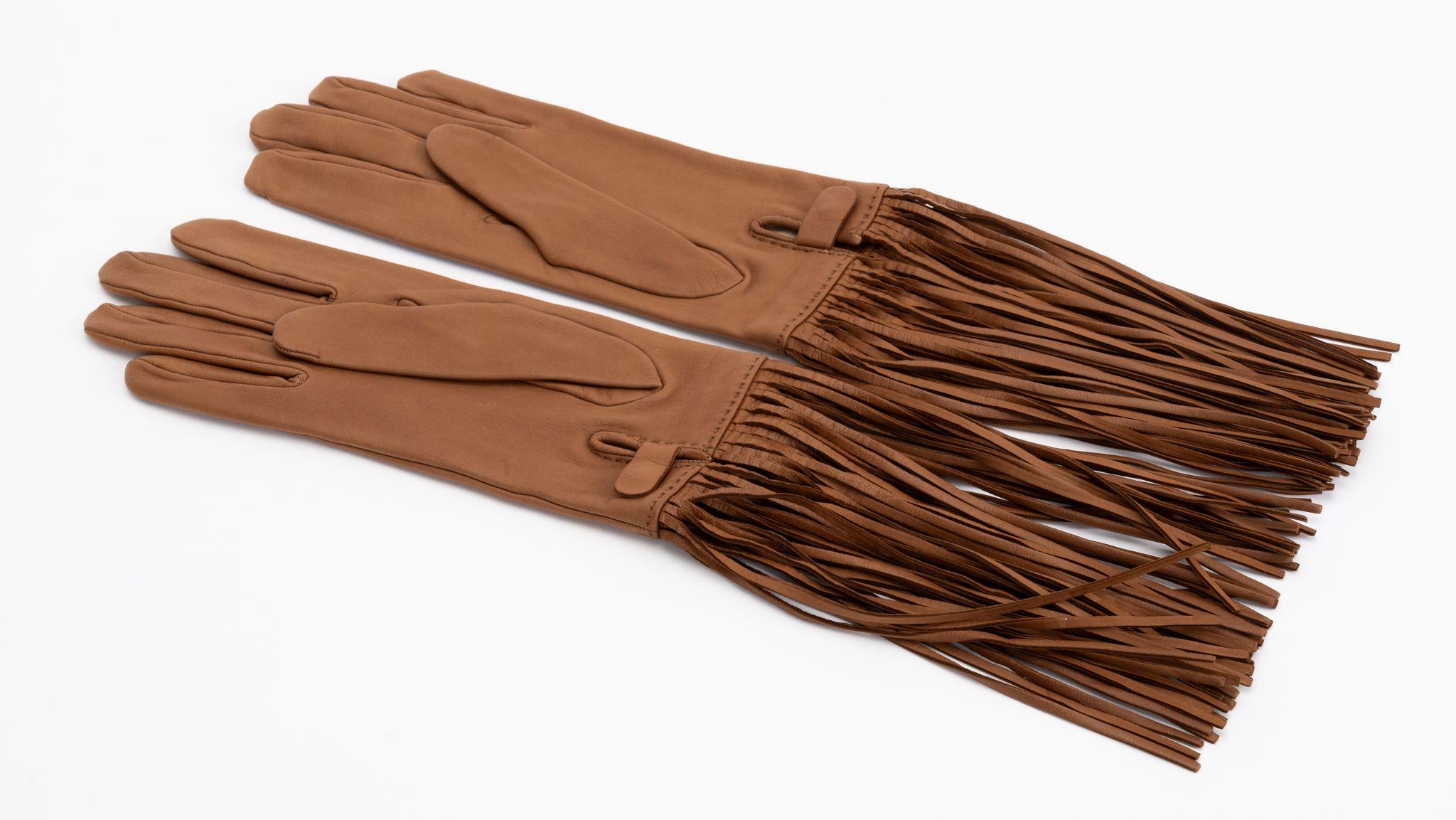 Hermès new caramel lambskin leather gloves with long fringe decoration. Silk lining , size 8.