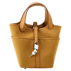 Cargo Picotin Schlosstasche aus Segeltuch und Swift PM von Hermès