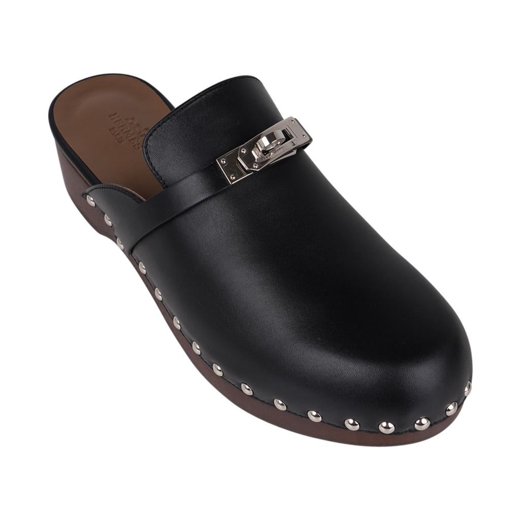 Noir Hermès - Mules Carlotta en cuir de veau noir avec boucle Kelly en palladium, 39 / 9, neuves dans leur boîte en vente