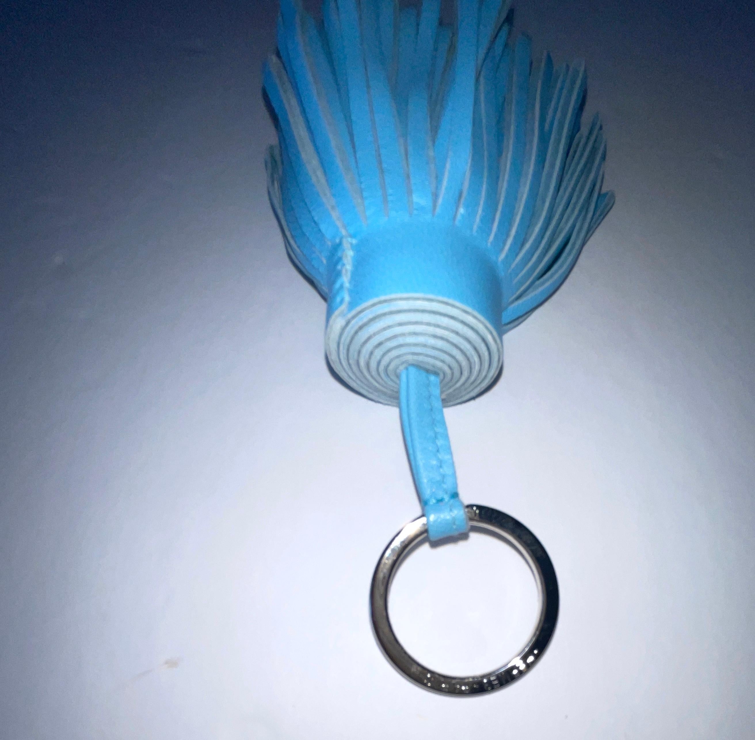 Carmen Key RingKey 
 Milo lambskin with stainless steel plated hardware
Color is Ciel

Made in France

Measures 2.8