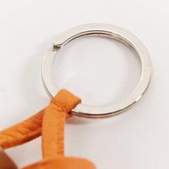 HERMES Carmen Uno Dos brown orange double tassel silver ring bag charm