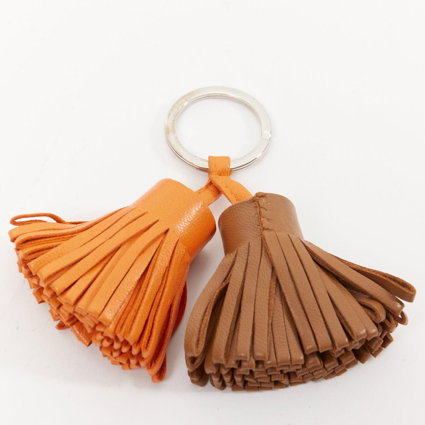 Women's HERMES Carmen Uno Dos brown orange double tassel silver ring bag charm For Sale