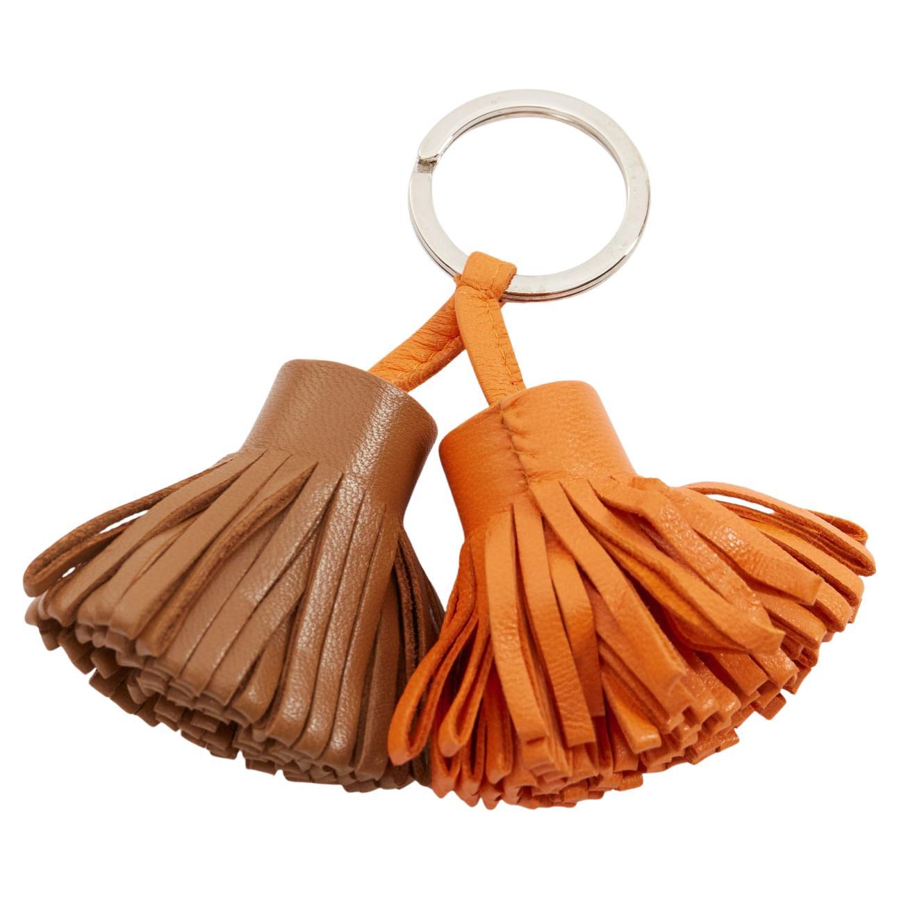 HERMES Carmen Uno Dos brown orange double tassel silver ring bag charm For Sale