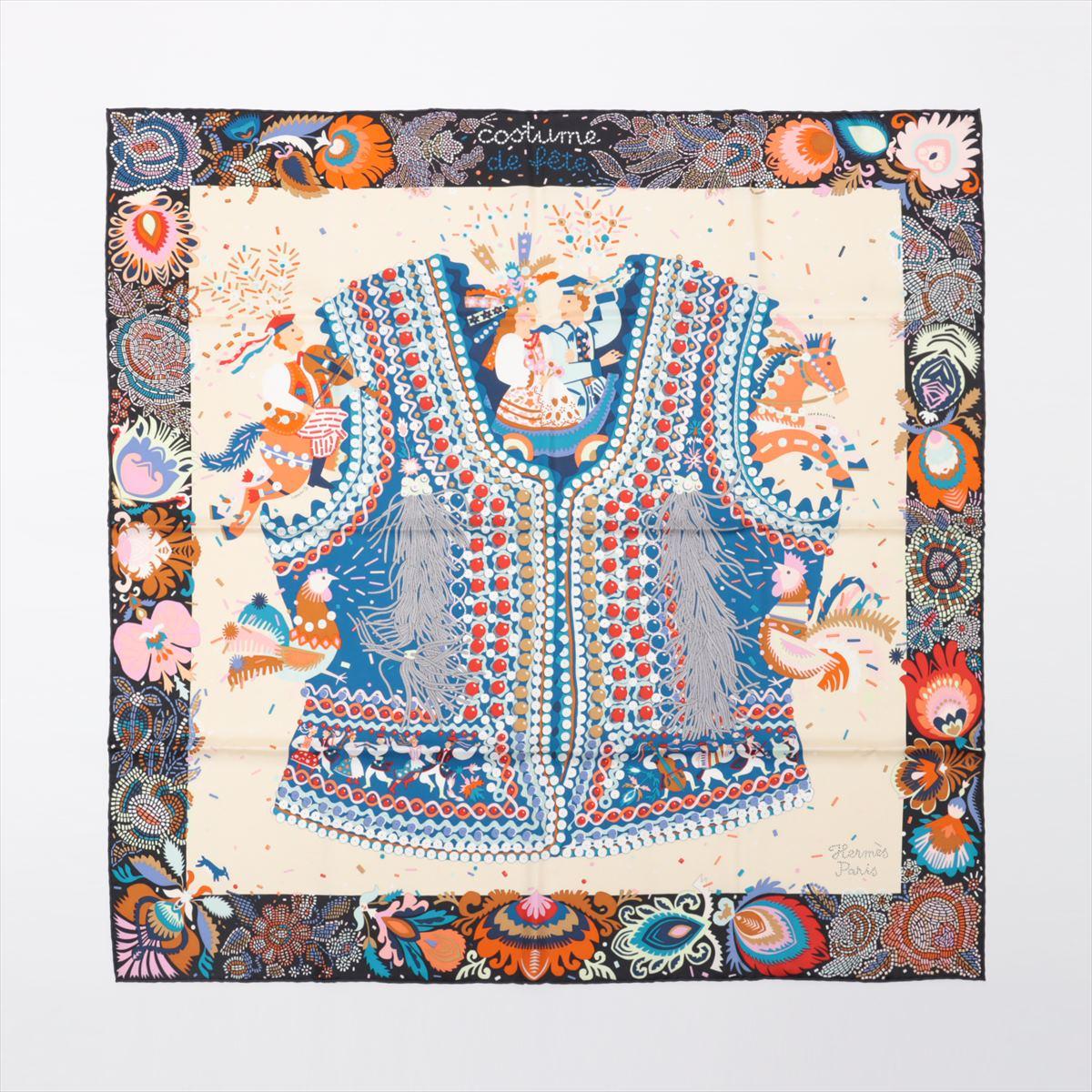 The Hermès Carré 90 Costume de Fête Silk Scarf is a timeless accessory that blends sophistication with artistic flair. Made from premium silk, it features the intricate 