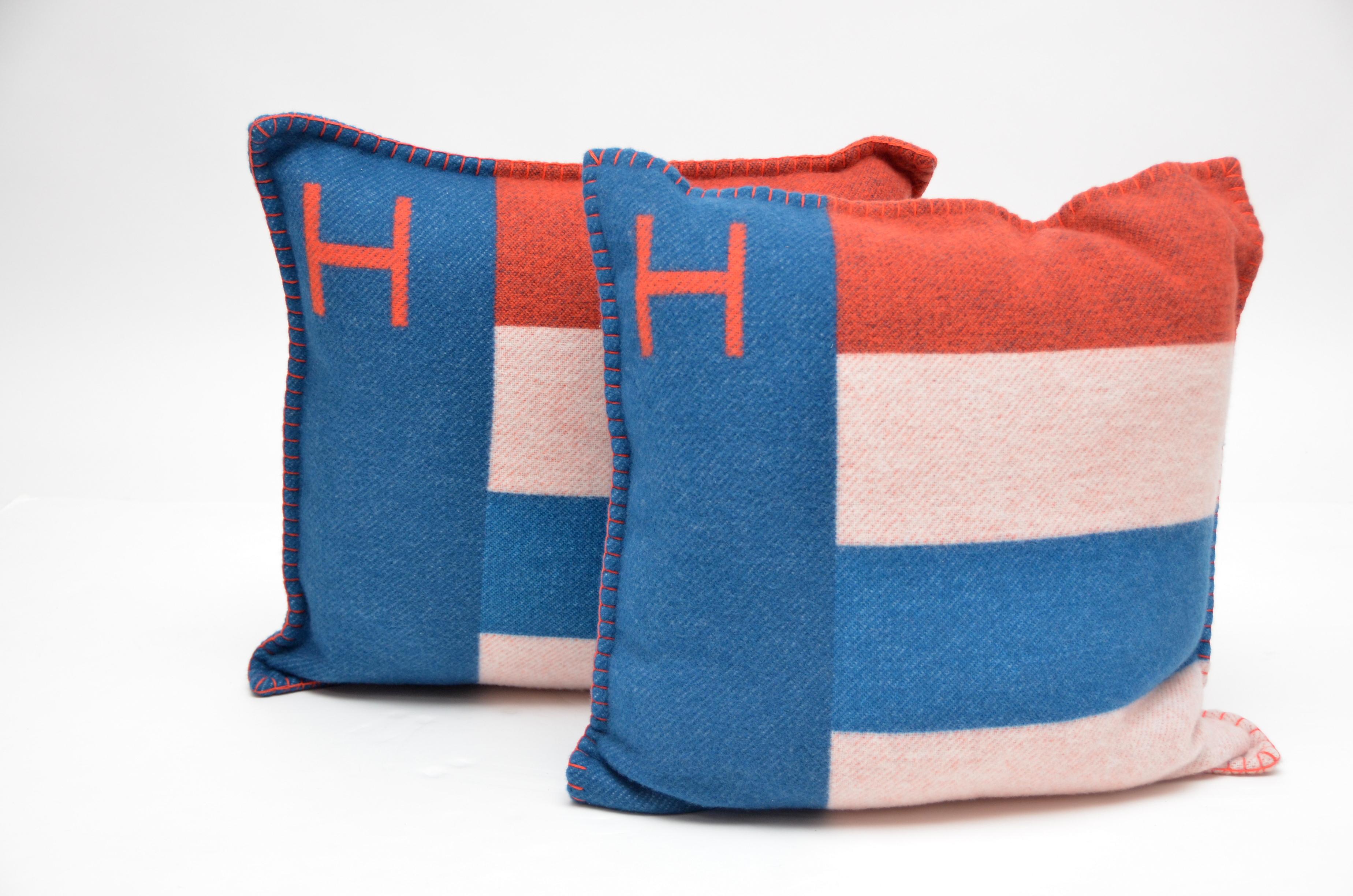 Hermes Cushion Casaque Bleu/Gre color 
Mix of Bleu, orange and off white.Please see pictures for reference 
90% Merino Wool  10% Cashmere 
 Set /Two  with dust bags 
New never used.
Made in Great Britain
20/20 