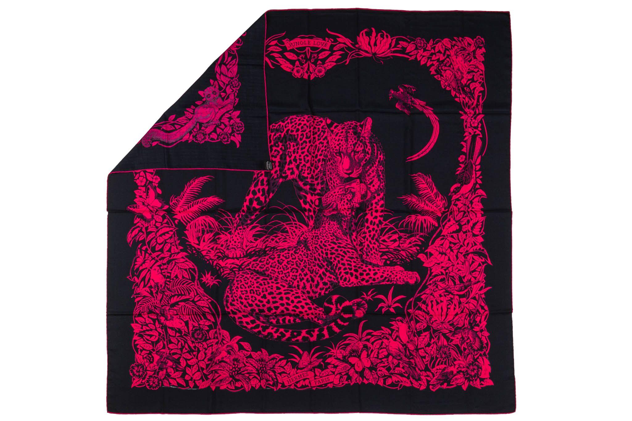 Hermès oversize square cashmere and silk blend Jungle Love scarf by Robert Dallet. Black and fuchsia color way with hand-rolled edges. Comes in original box.