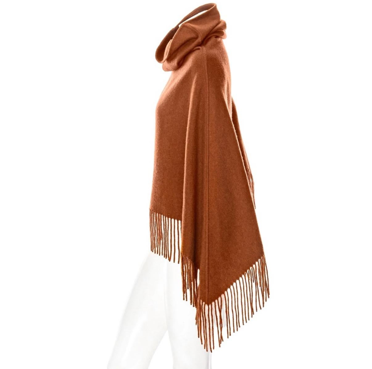 Hermès Brown Cashmere Fringed Cowl-Neck Poncho

Brown / Ochre
Cowl turtleneck
Fringed edge
Pullover
Short
Made in France
100% cashmere
Excellent preowned condition with little to no signs of wear and no notable flaws
Size & Measurements
Approximate,