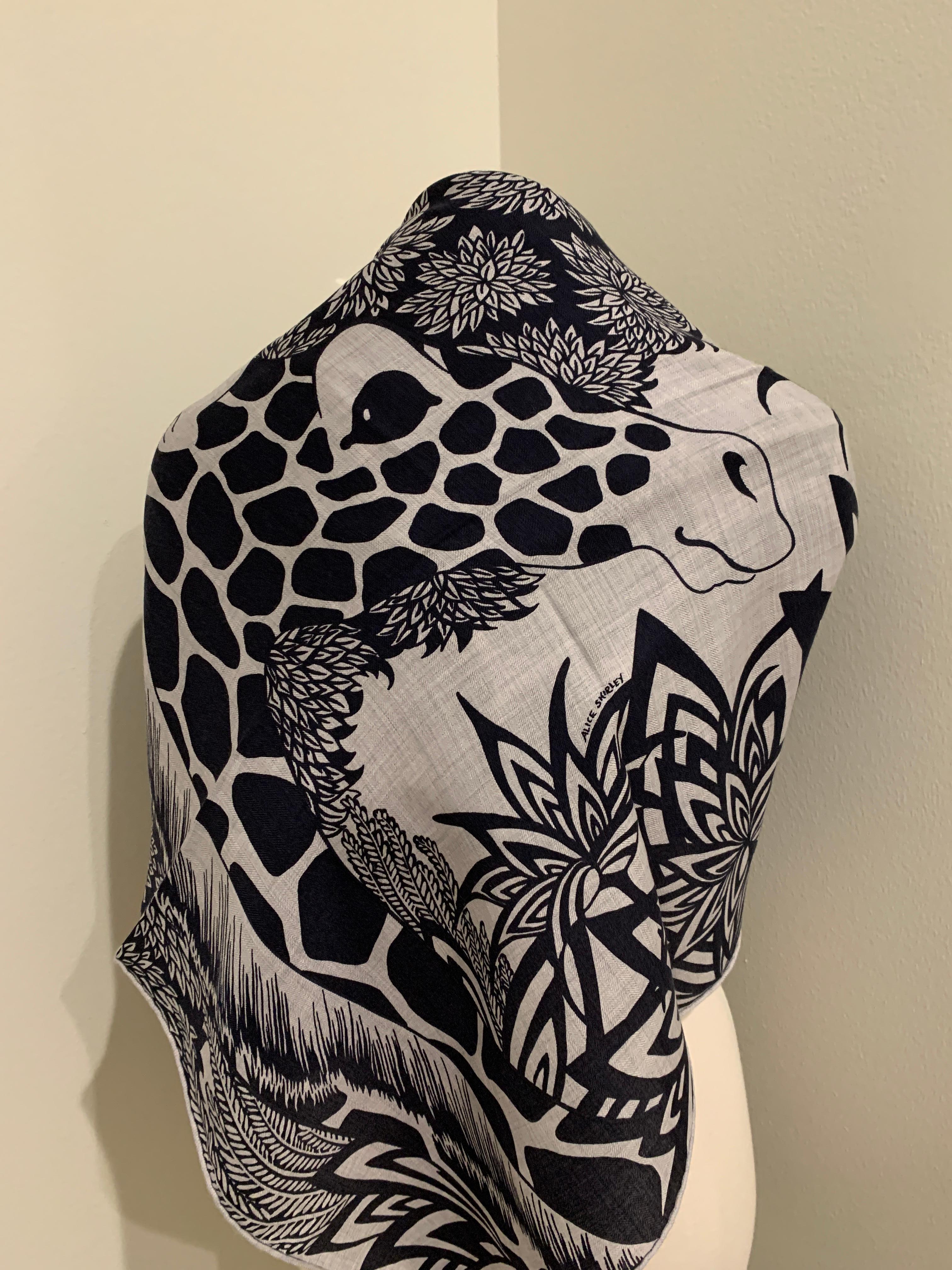Hermes Cashmere Shawl/Scarf
The Three Graces 
Giraffes
Designed by Alice Shirley


Cashmere shawl large 140cmShawl in cashmere and silk with hand-rolled edges (70% cashmere, 30 % silk).

Printed on our iconic cashmere and silk material, this giant