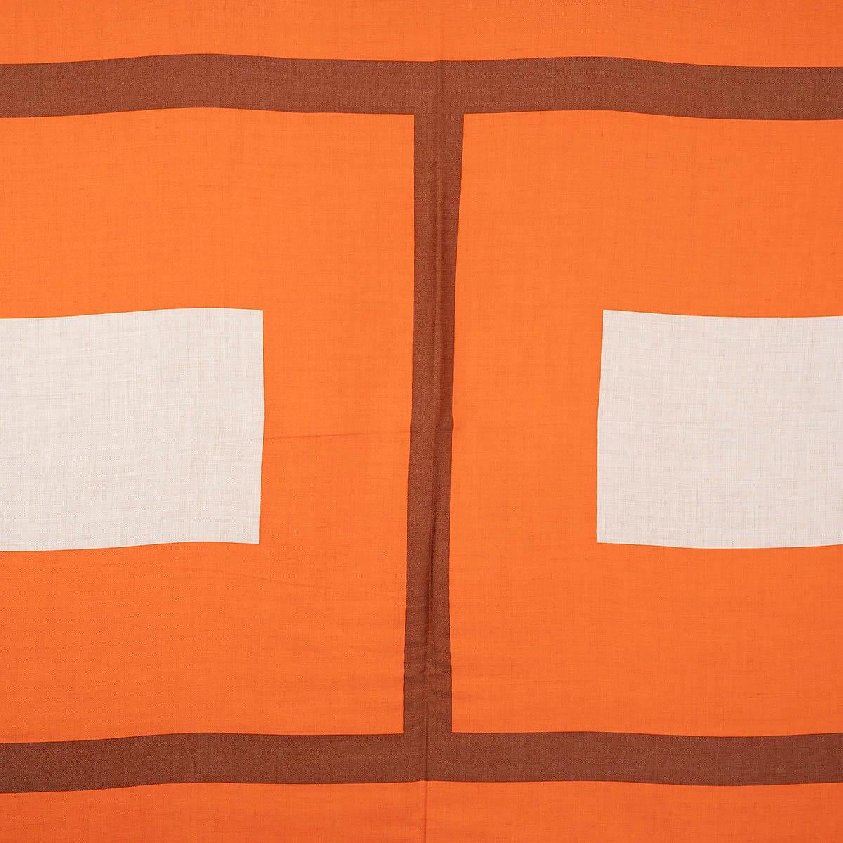 100% authentic Hermès H Jumping shawl in natural cashmere (70%) and silk (30%) with orange and caramel brown H print. Finished with hand-rolled and fringed edges. Brand new.

Measurements
Width	90cm (35.1in)
Length	180cm (70.2in)

All our listings