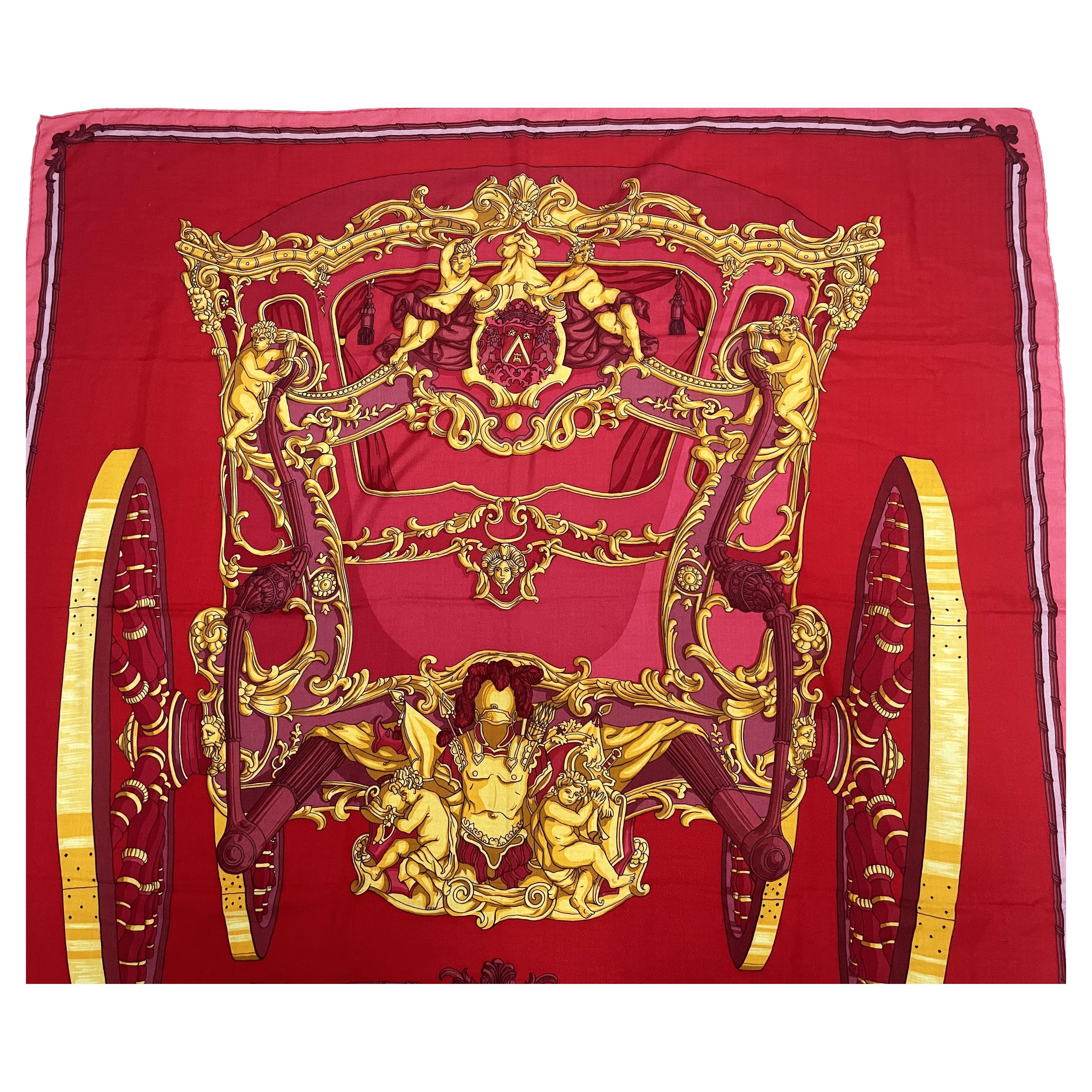 Very beautiful decorative 140 cm x 140 cm scarf made of 65% cashmere and 35% silk in the colors red, yellow and pink.

The theme of the large Hermes Shawel  is:
'GRAND CARROSSE povr by AMBASSADEVR par HERMES A PARIS' ANNO MDCC: 

Measurement 140 cm