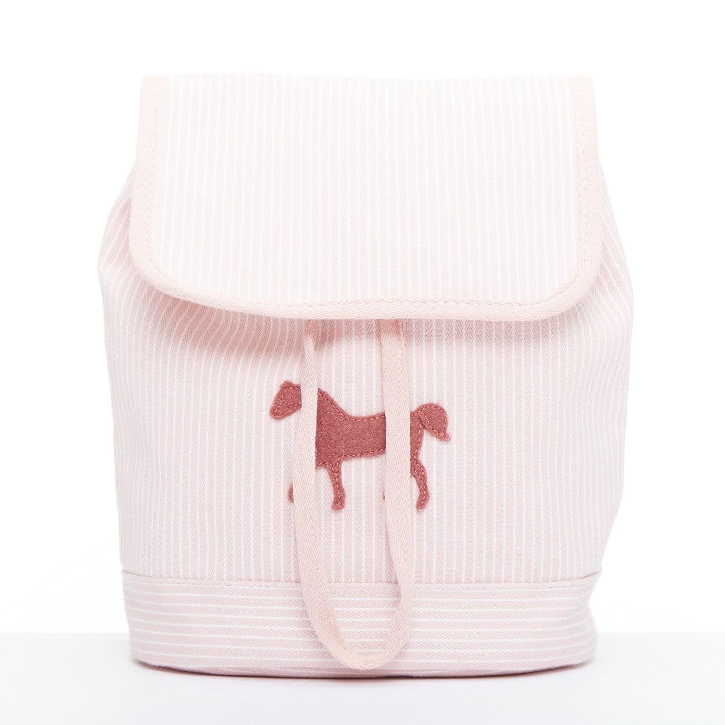 HERMES Cavalcolor pink white cotton wool felt horse backpack
Reference: KYCG/A00154
Brand: Hermes
Model: Cavalcolor Baclpack
Material: Cotton
Color: Pink, White
Pattern: Striped
Closure: Drawstring
Lining: Multicolour Fabric
Extra Details: Backpack