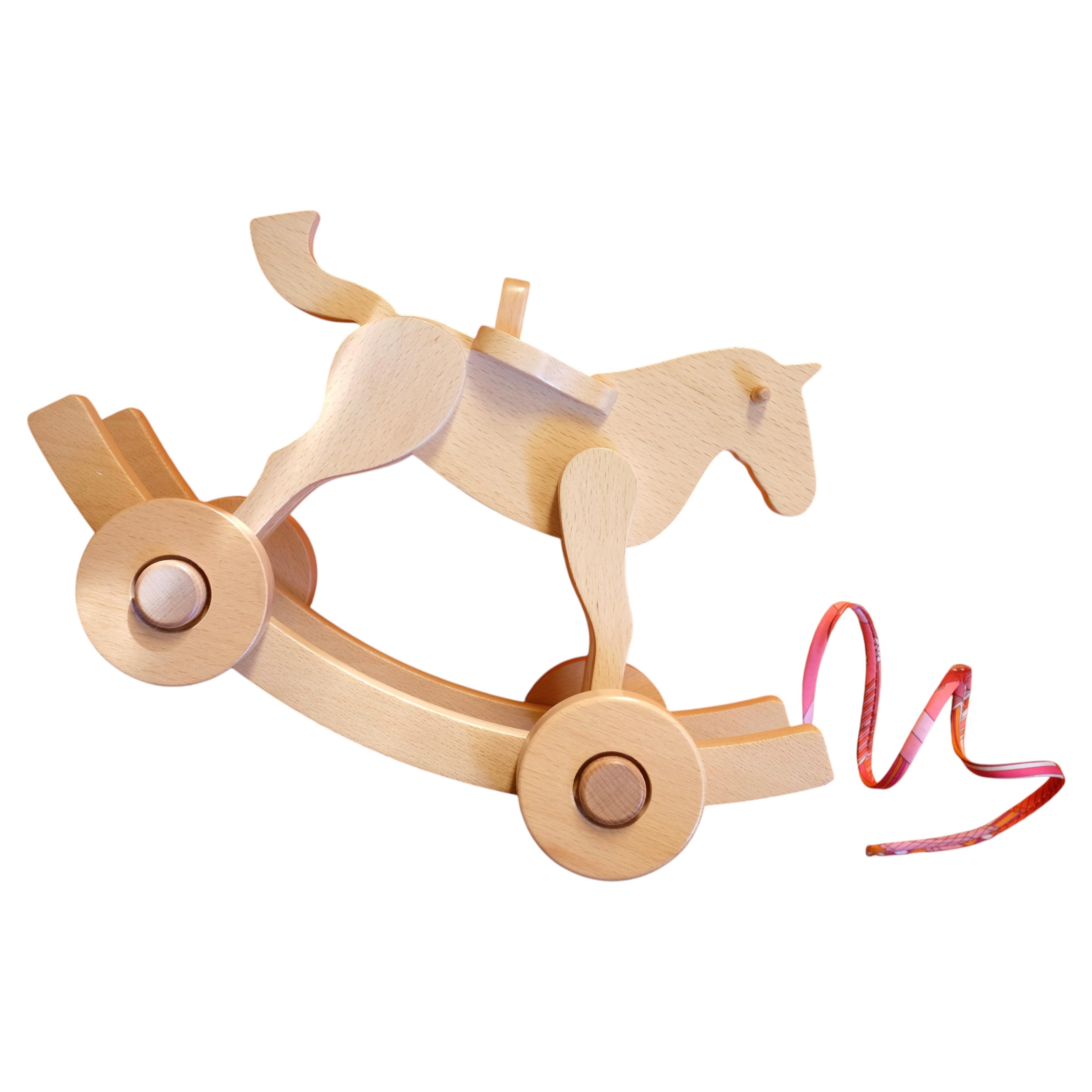 HERMÈS - Spirit roller horse made of natural beech wood