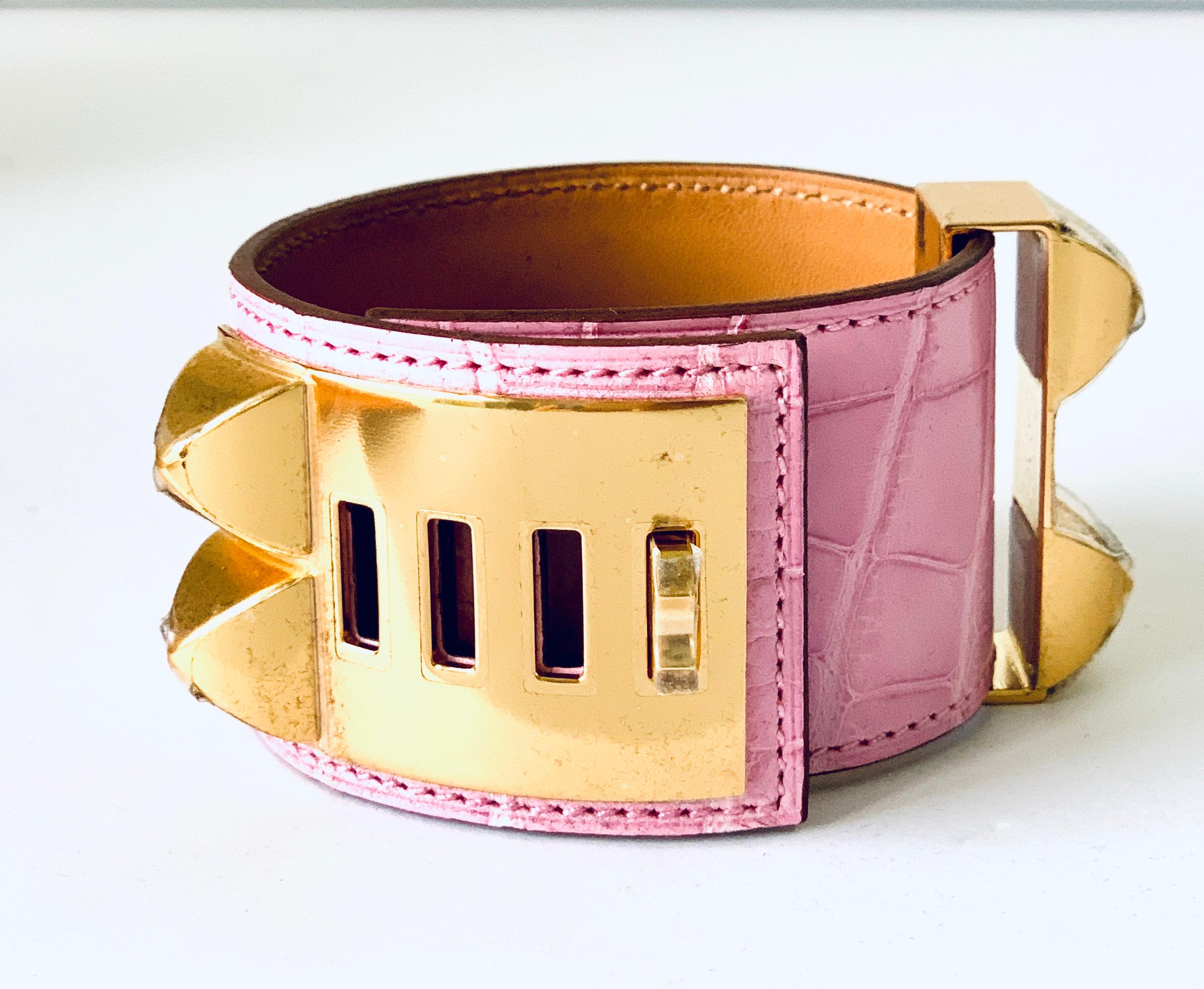 Hermes bracelet in Bubblegum pink Alligator
Size is T2 
Plastic on all the hardware
Scales are beautiful
Hermes Velvet Dustcover, shopping bag, box, ribbon all included
Make a statement with this Chic CDC
This color is very rare!!
