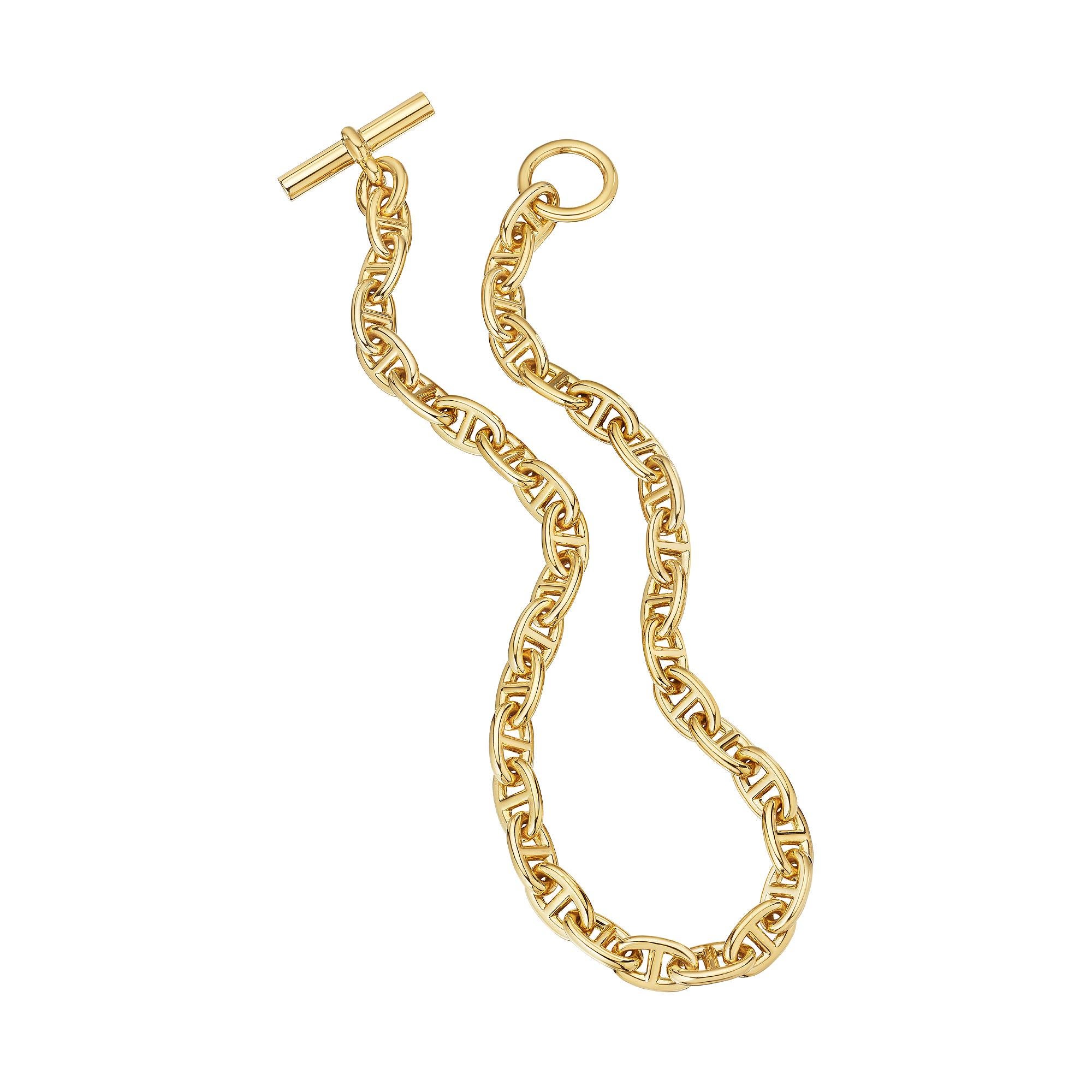Entourez-vous d'or précieux avec ce collier à maillons à bascule de taille moyenne de la chaîne d'ancre vintage d'Hermès Paris.  Signé Hermes.  Circa 1980.  Or jaune poli 18 carats.