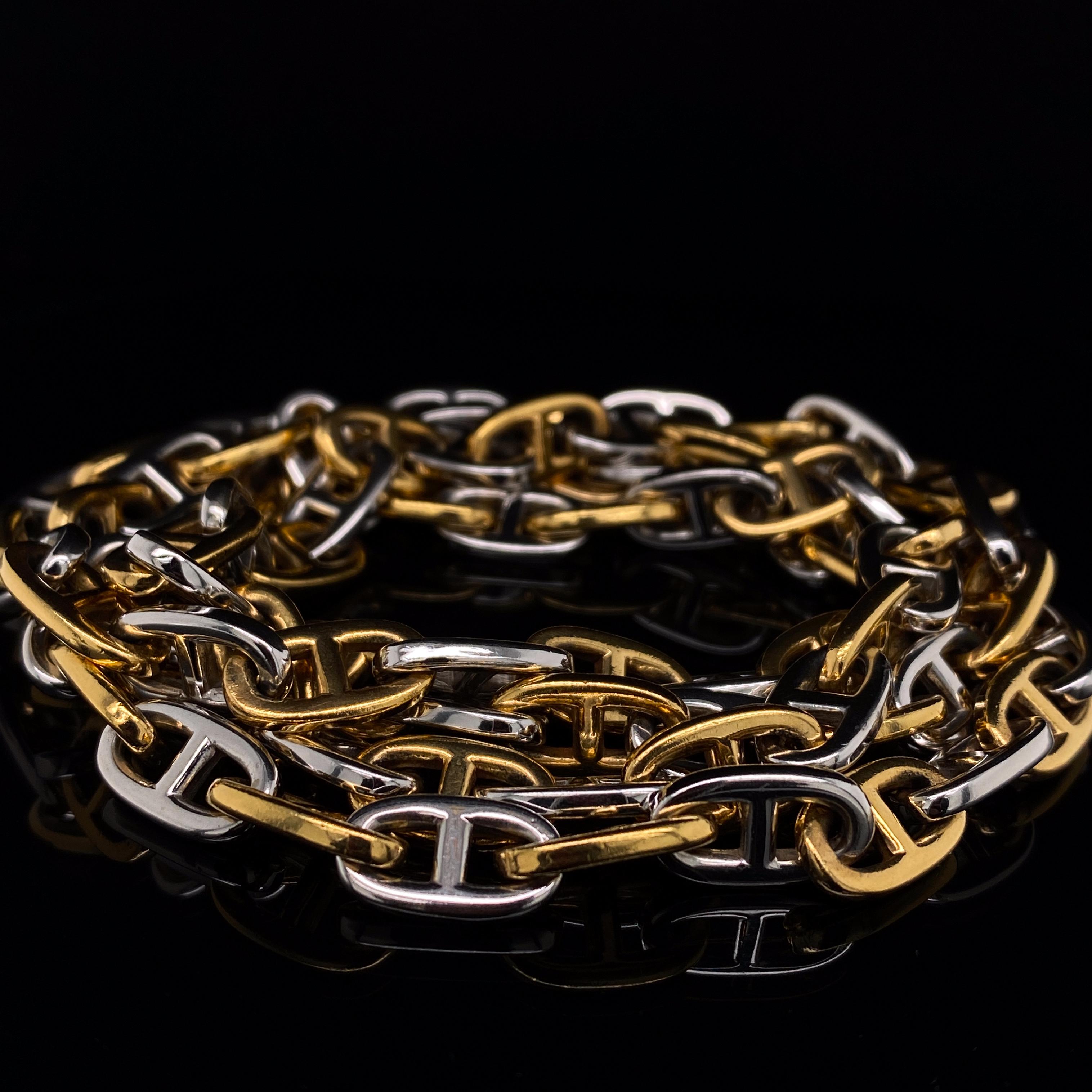 An Hermès Chaîne d'Ancre 18 karat Yellow and White Gold necklace circa 1950.

This iconic Hermès necklace is an extra-specially long length of 32 inches, composed of polished 18 karat yellow and white gold oval links each with a bar spacer, to a