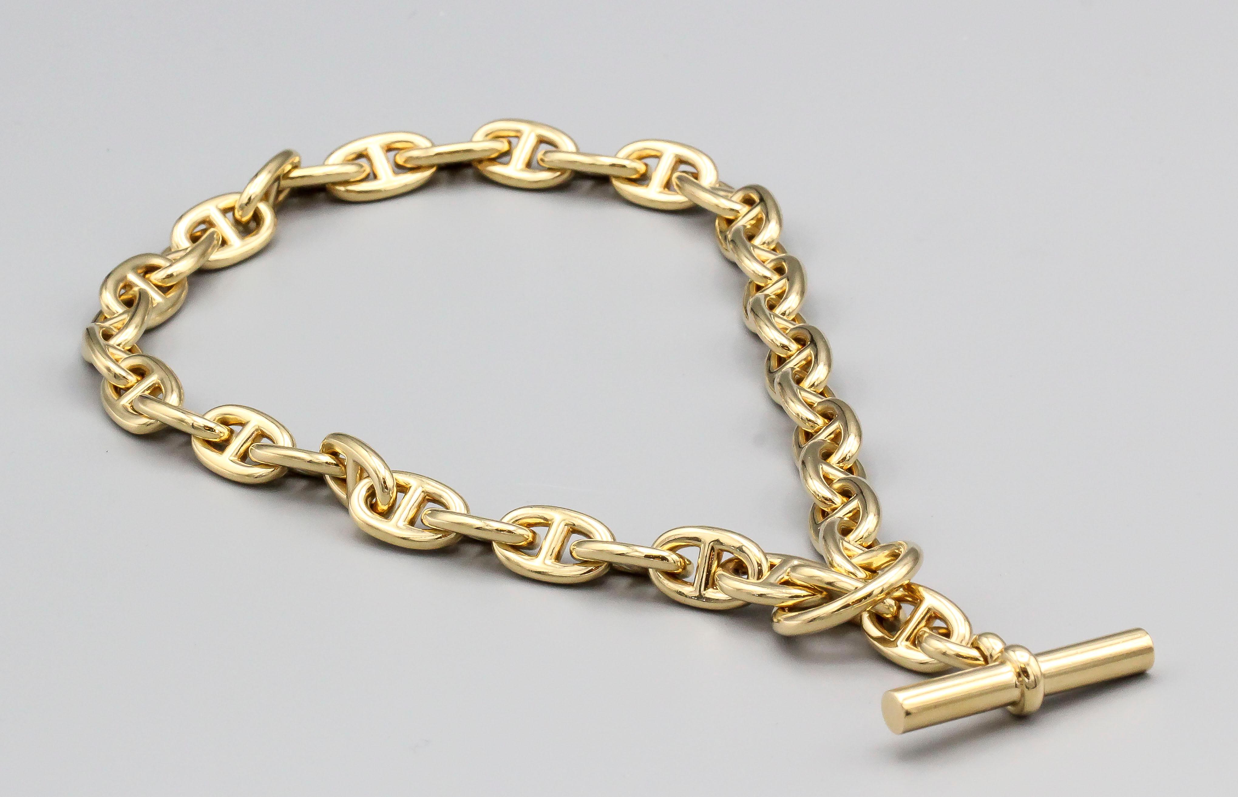 Stylish 18K gold toggle link necklace , from the Chaine D'Ancre collection by Hermes.  It is the medium size and currently retails for $34,900.

Hallmarks: Hermes, reference numbers, French 18k gold assay mark, maker's mark.