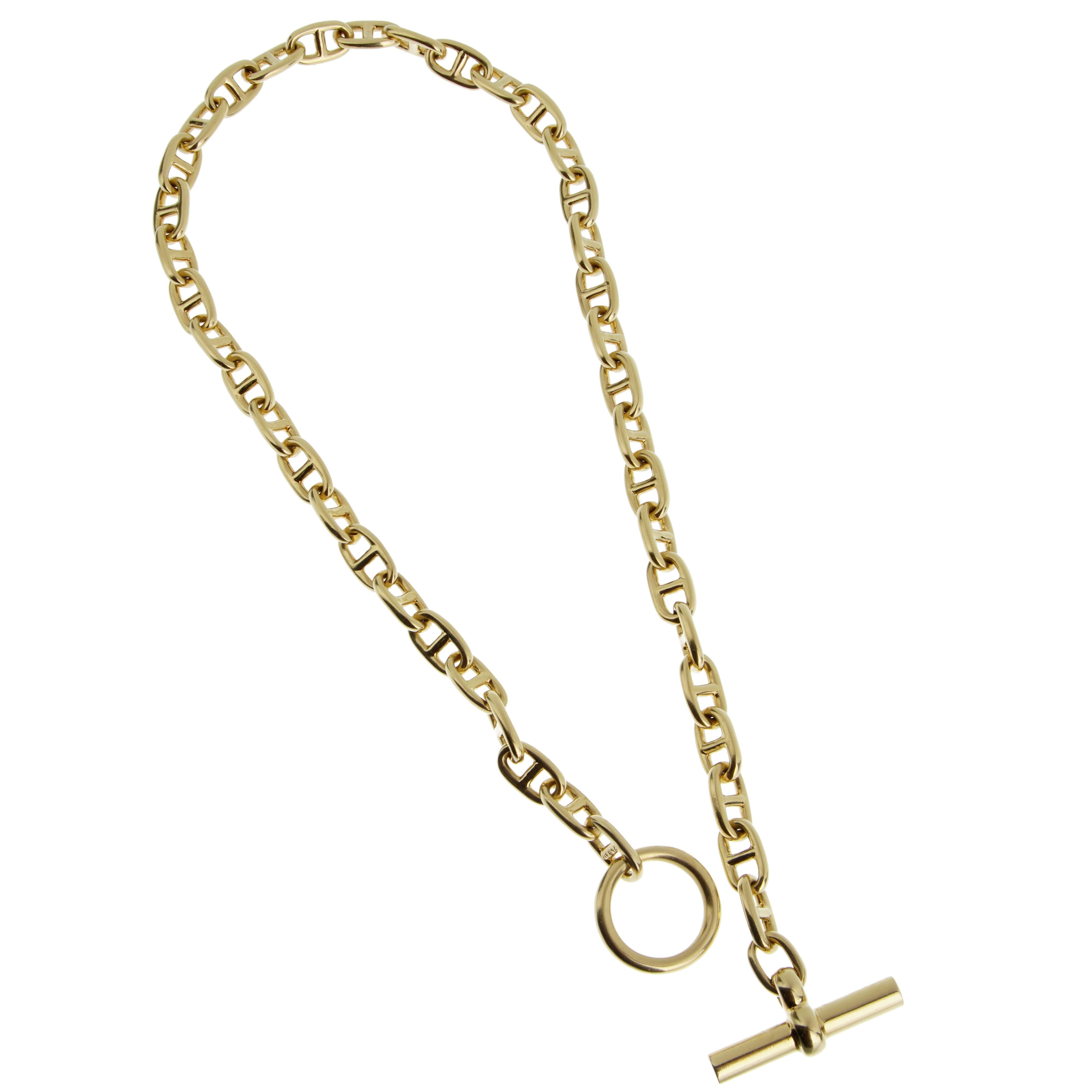 Step into the world of luxury with the Hermes Chaine d'Ancre Yellow Gold Toggle Necklace, a piece that perfectly encapsulates the brand's philosophy of elegance and sophistication. With a length of 16 inches and crafted from 77.3 grams of 18k gold,