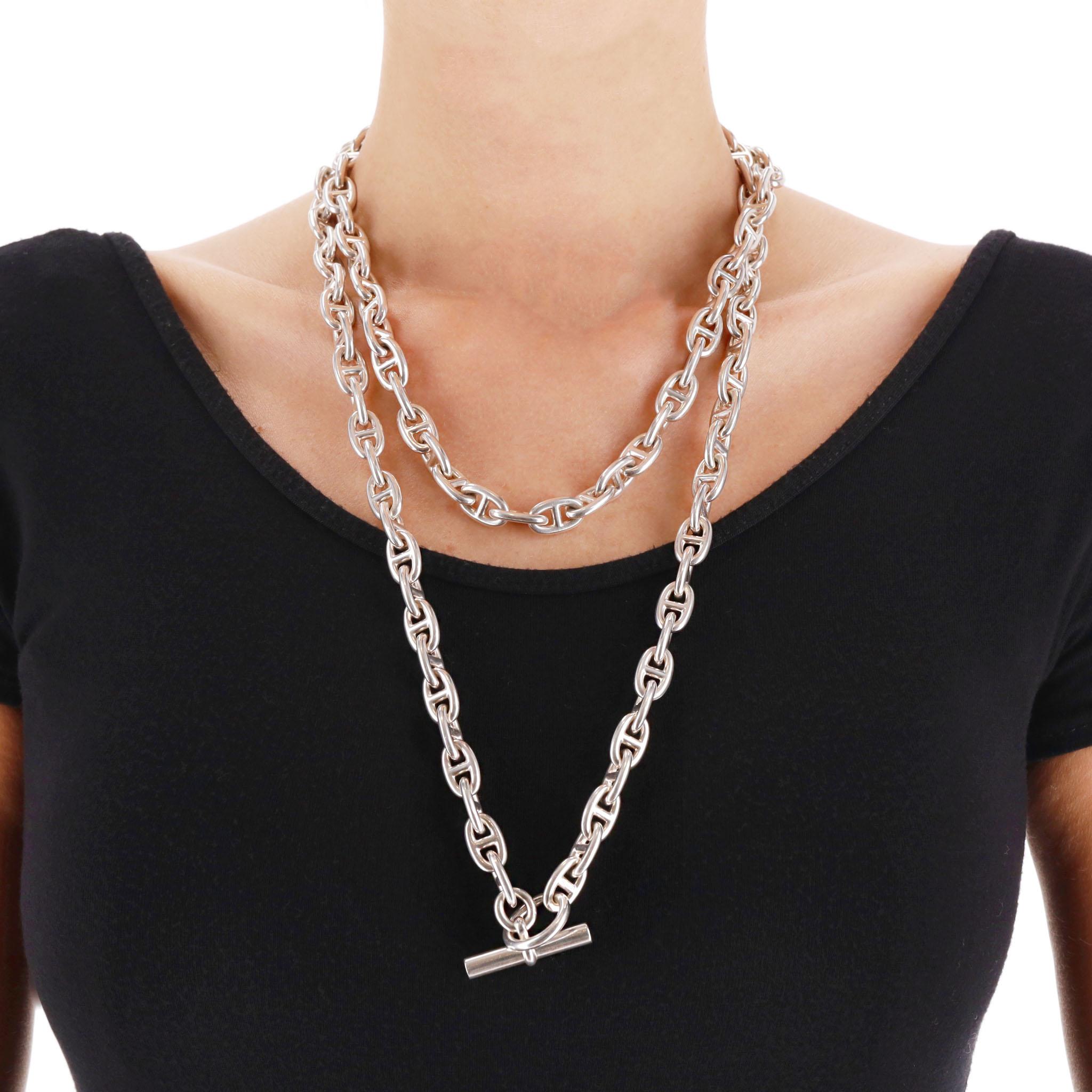 Rare Model - Hermes Chaîne d’Ancre 925 Sterling Silver Large Long Necklace

From 1990's is this very heavy link chain necklace crafted from 925 sterling silver and detailed with a signature T bar closure.

It can be wrapped around the neck twice for