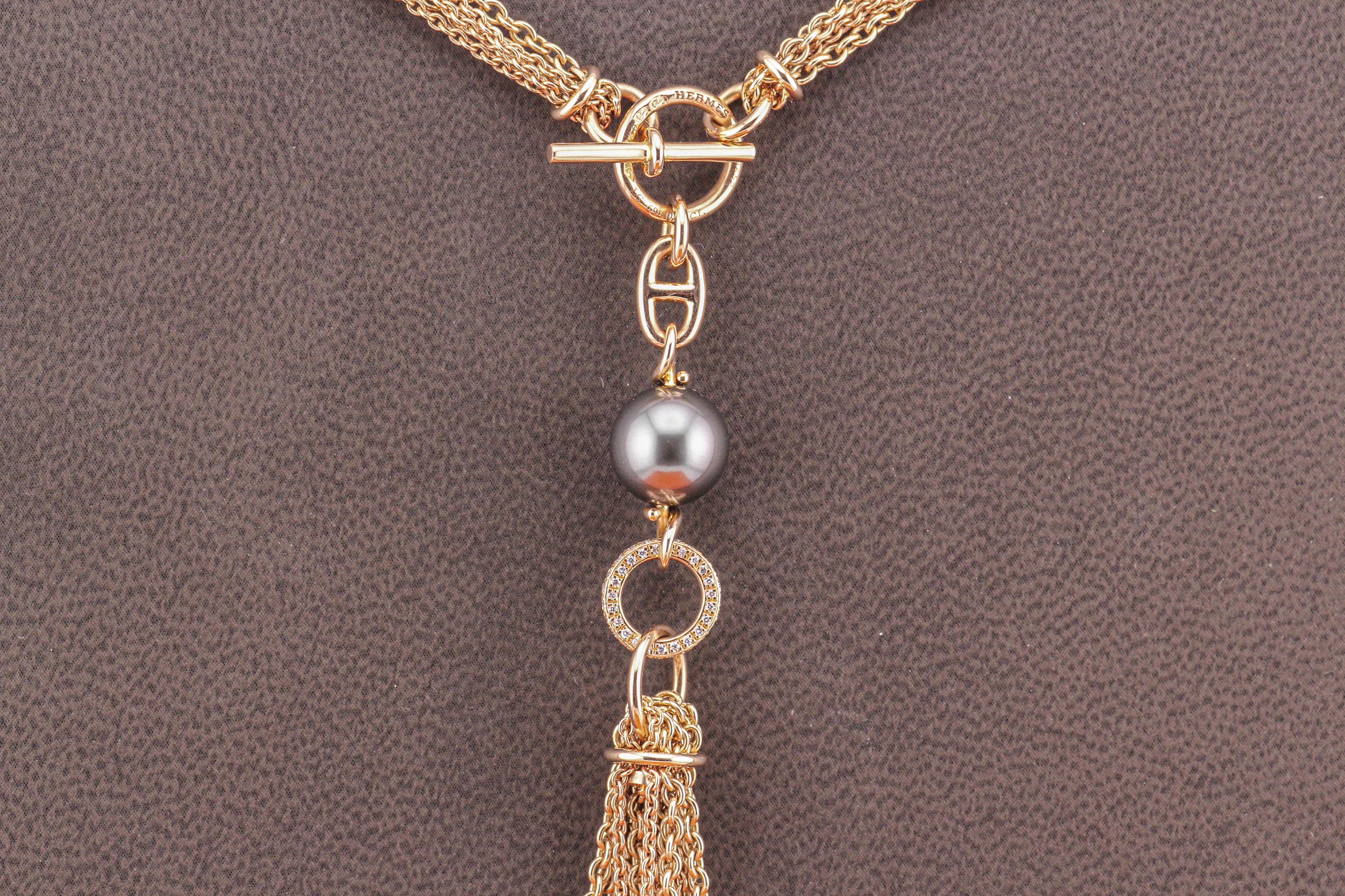 Elevate your ensemble with the exquisite allure of this Hermes Chaine D'Ancre Black Pearl Diamond 18k Rose Gold Sautoir Tassel Necklace. Meticulously crafted, this necklace is a testament to Hermes' legacy of creating exceptional jewelry that