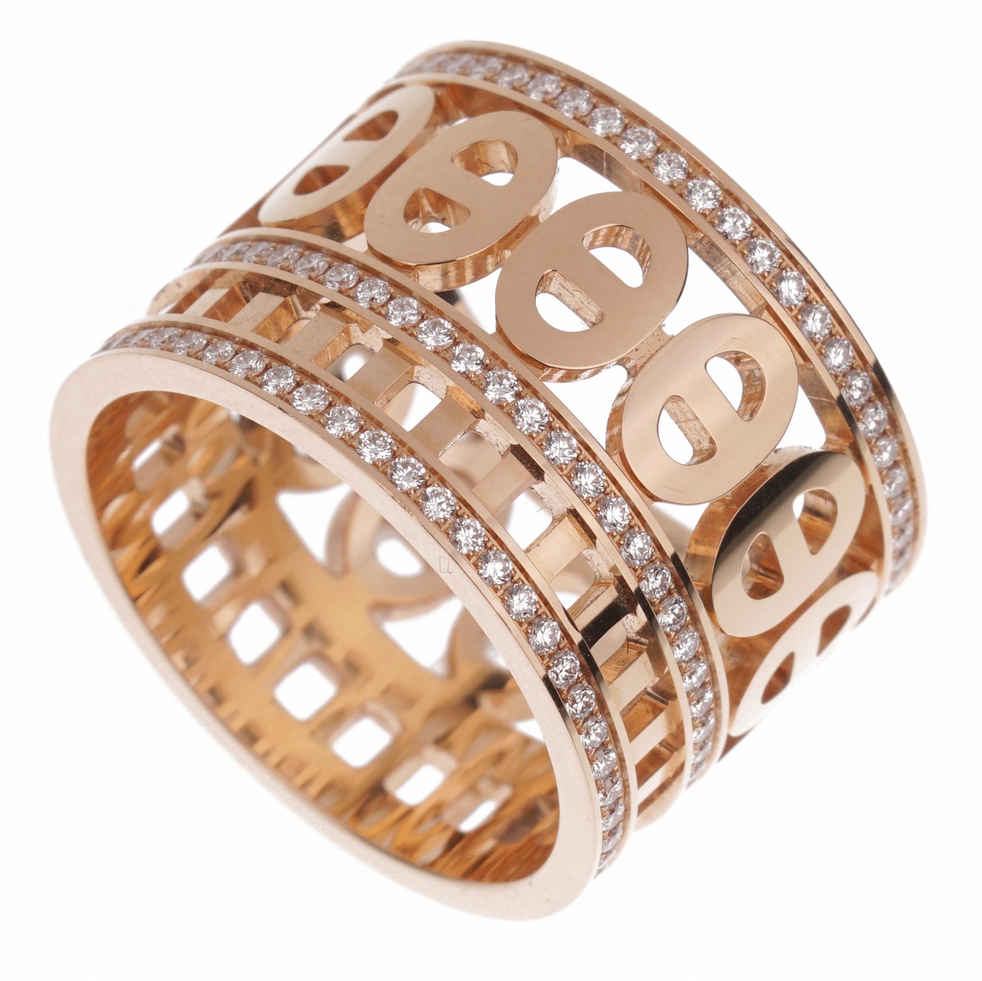 The Hermès Chaine d'Ancre Divine Rose Gold Diamond Ring is an exquisite masterpiece that embodies the pinnacle of luxury and craftsmanship. This remarkable piece of jewelry draws inspiration from the iconic Chaine d'Ancre motif, a hallmark of