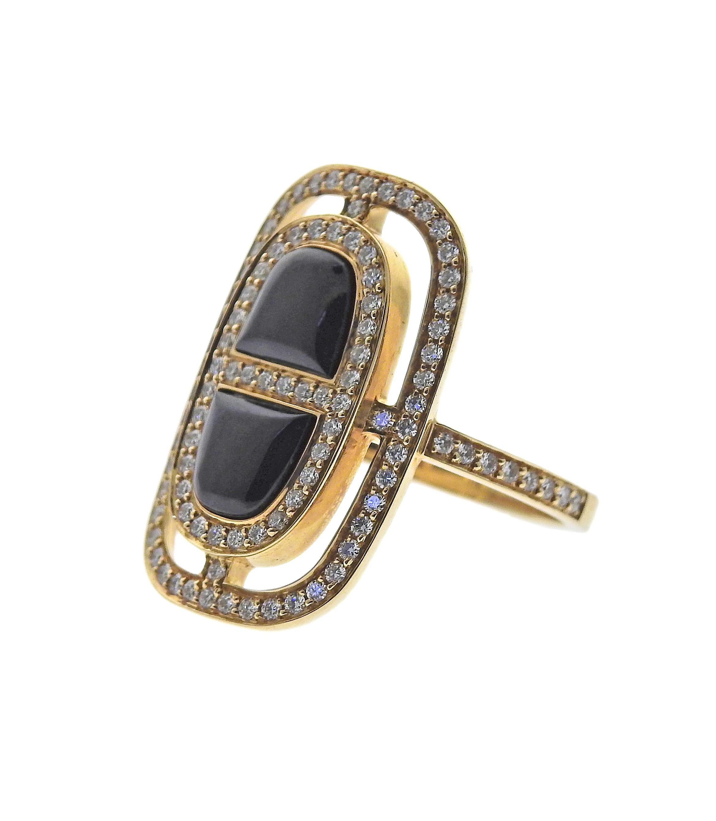 Hermes Chaine D'Ancre 18K yellow gold onyx ring set with 0.60ctw in VS/F diamonds. Ring size 57 ( US 8) top measures 25mm x 18mm. Marked: Hermes, made in France, 57, 18AD071123, 106D 0.60ct, Au750. Weight is 8.5 grams.