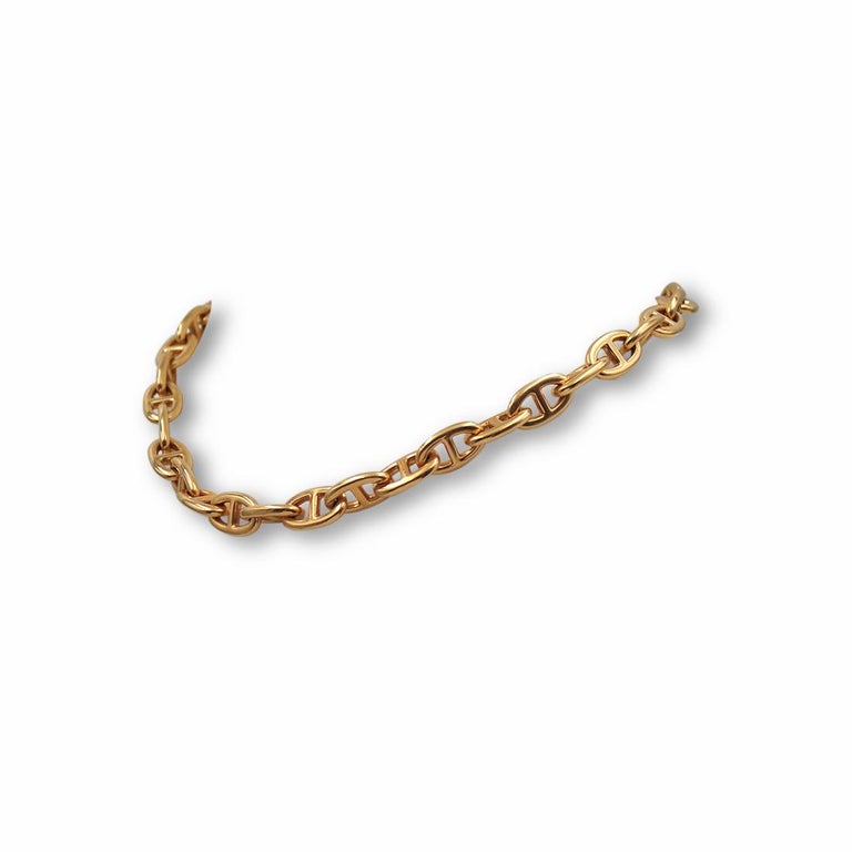 Authentic Hermès Chaîne d'ancre necklace crafted in 18 karat yellow gold. The iconic ship anchor links are completed by a toggle clasp. The links measure .67 inches x .40 inches and the necklace measures 17.2 inches in length. Signed Hermès, Au750,