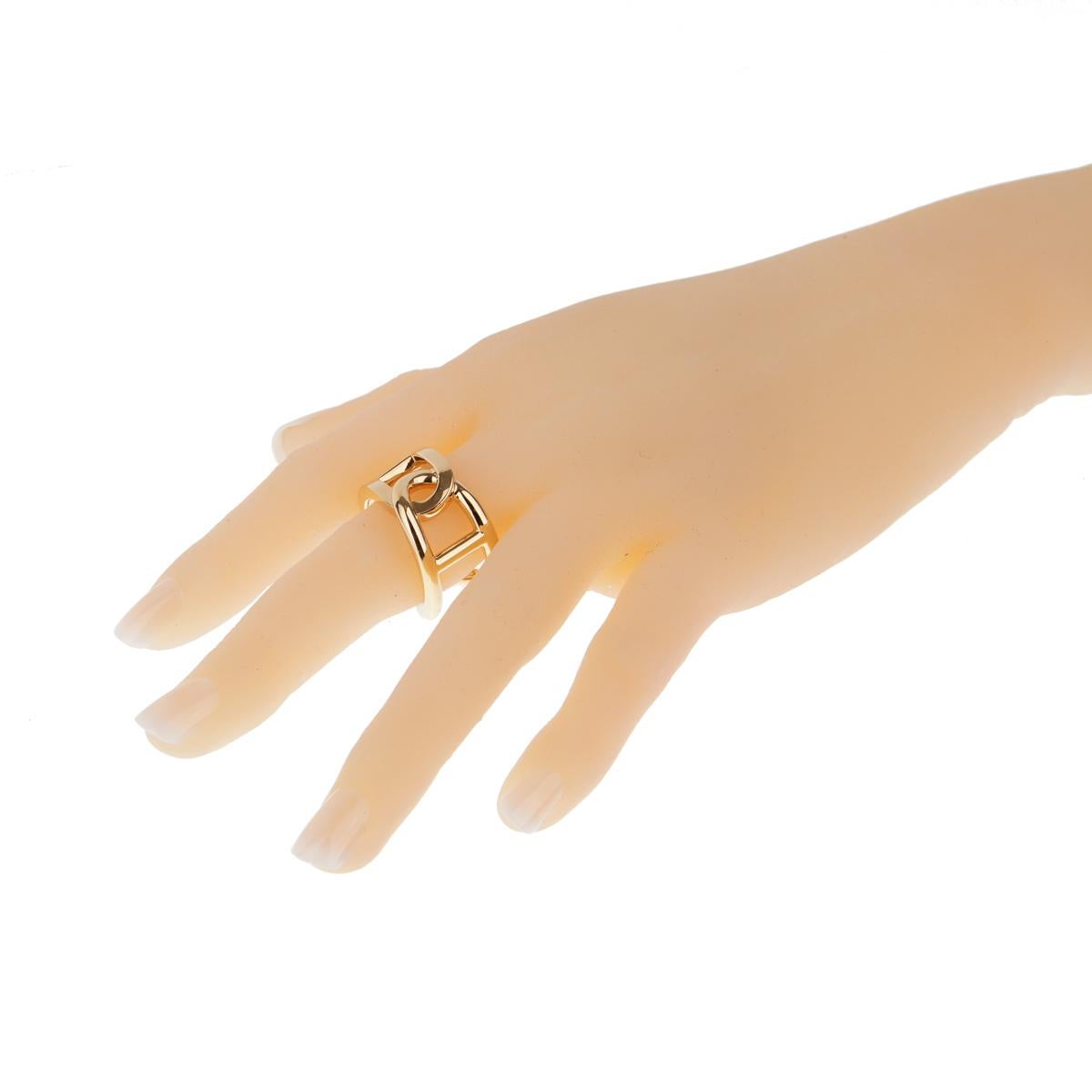 Own a piece of Hermes history with this classic Chaine d'Ancre gold ring in subtle, 18kt yellow gold. This unmistakable motif combines classic H designs in a wide band.

Size 9 1/2