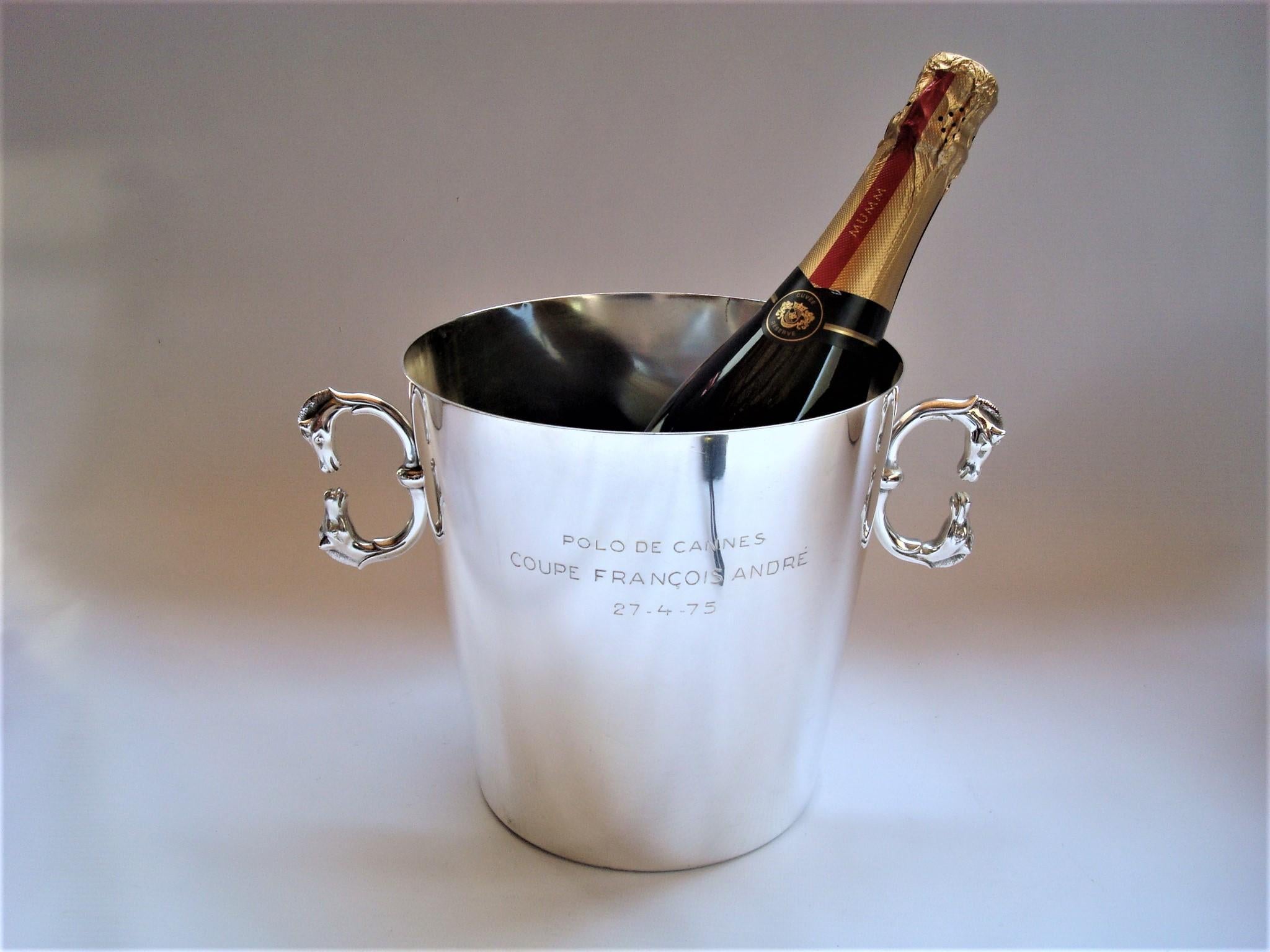 Hermes Champagne / Wine Bucket - Cooler. Polo Trophy Cannes 1975.
This Hermes ice bucket has double horse handles... and is super chic.
Amazing Hermès Horse Head Equestrian champagne ice bucket.
Given as a polo trophy in the 1970´s. 
Engraved :