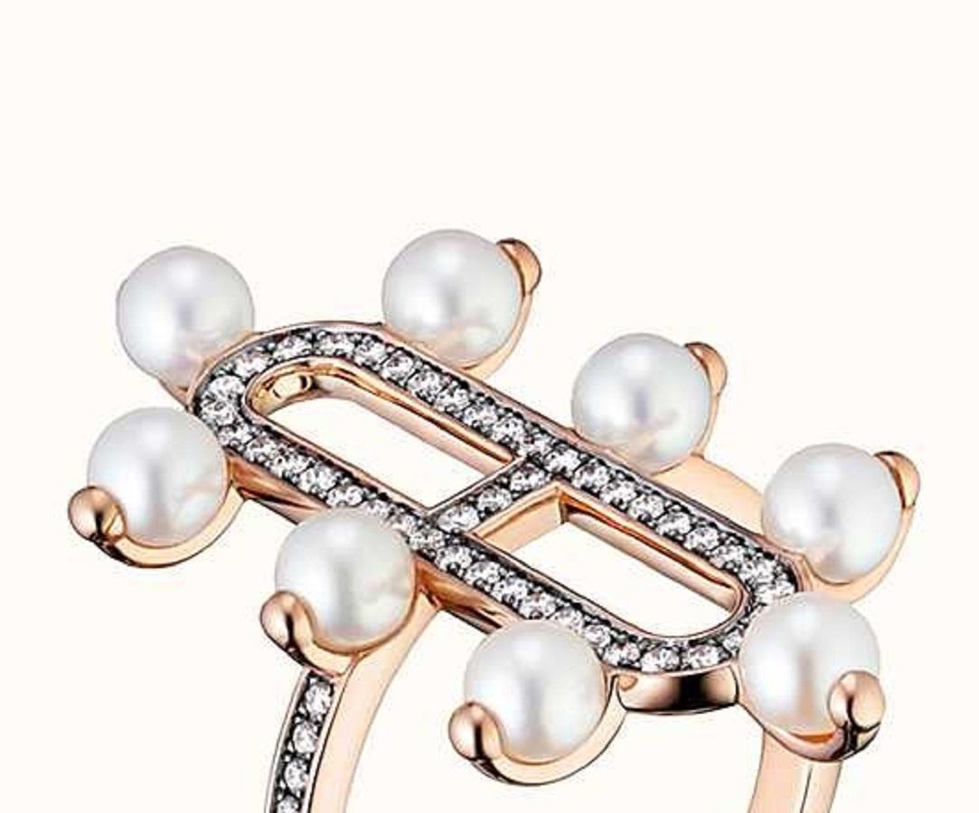 Size 52mm us 6
Ring in rose gold set with diamonds and Akoya pearls
Made in France
Rose gold 750/1000
Ring width: 0.2 cm  Motif size: 1.7 x 3.4 cm  71 diamonds  Total carat weight: 0.36 ct  8 Akoya pearls  Total carat weight: 4.8 ct