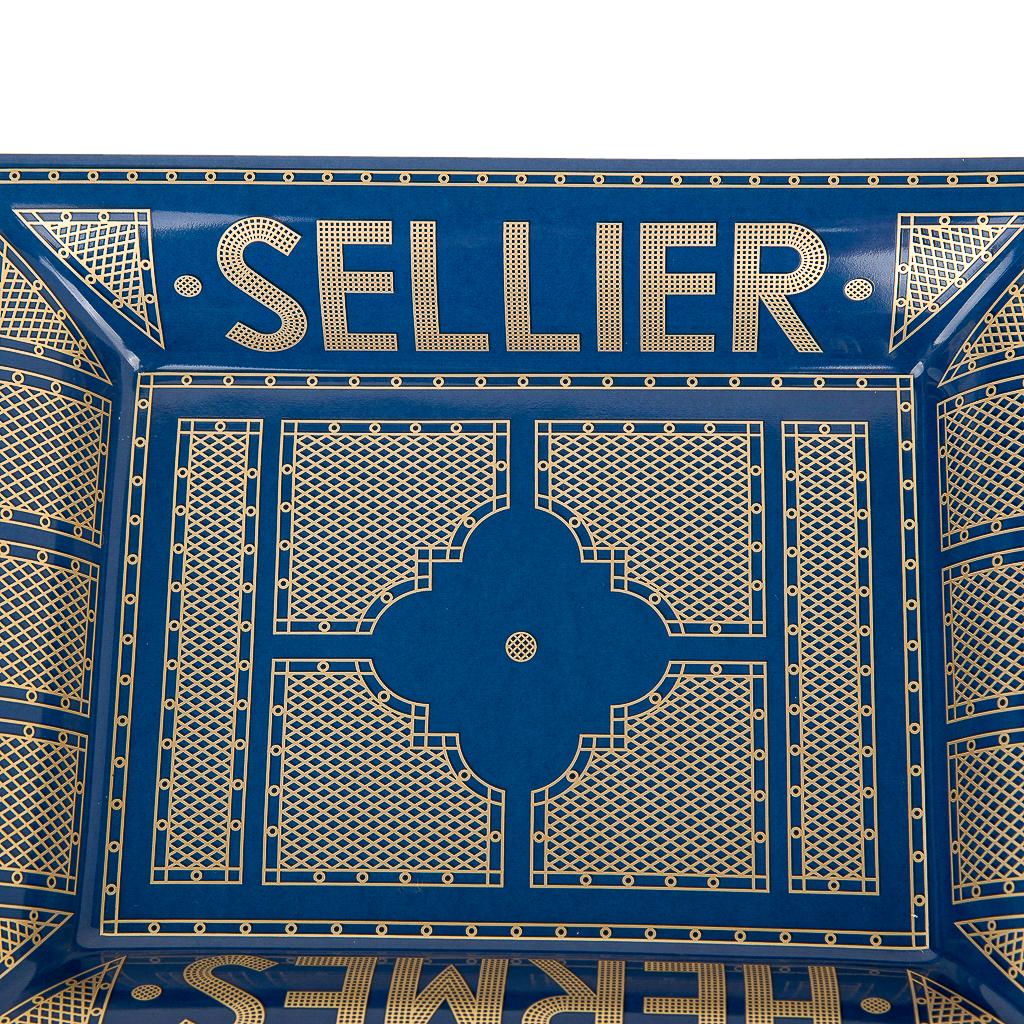 Guaranteed authentic Hermes Sellier change tray.
Printed Limoges Porcelain features Bleu Roi and gold.
A decorative ashtray piece perfect for any room.
Protected by velvet goatskin on the base.
Wonderful for desk or gifting.
Accompanied with
