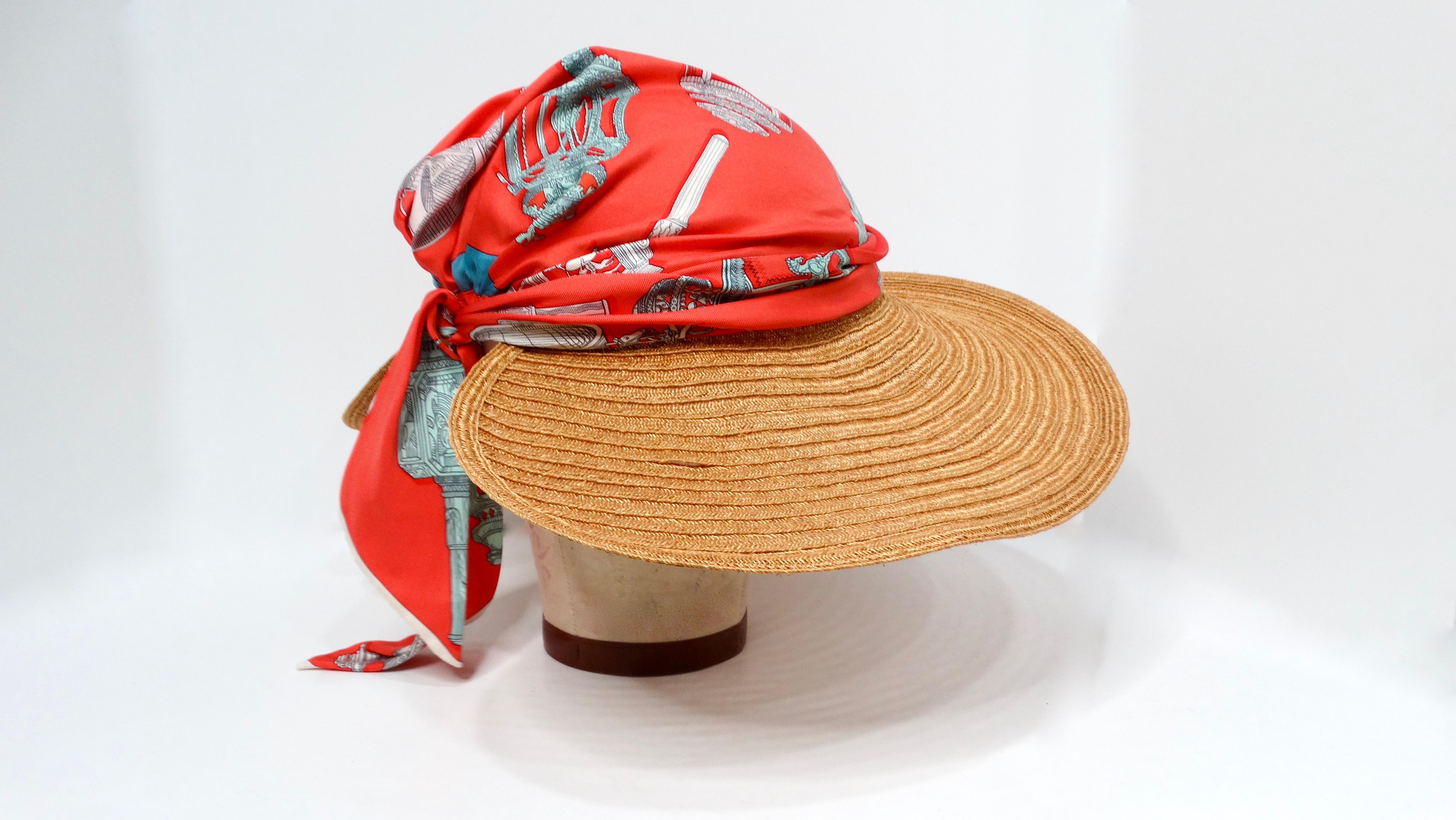 Le Chapeau Femme Ombline Coral Printed Silk Scarf Tresse Hat est une fusion étonnante de style et de sophistication, parfaite pour les journées ensoleillées à la plage ou les sorties décontractées en ville. Confectionnée en soie luxueuse, la teinte