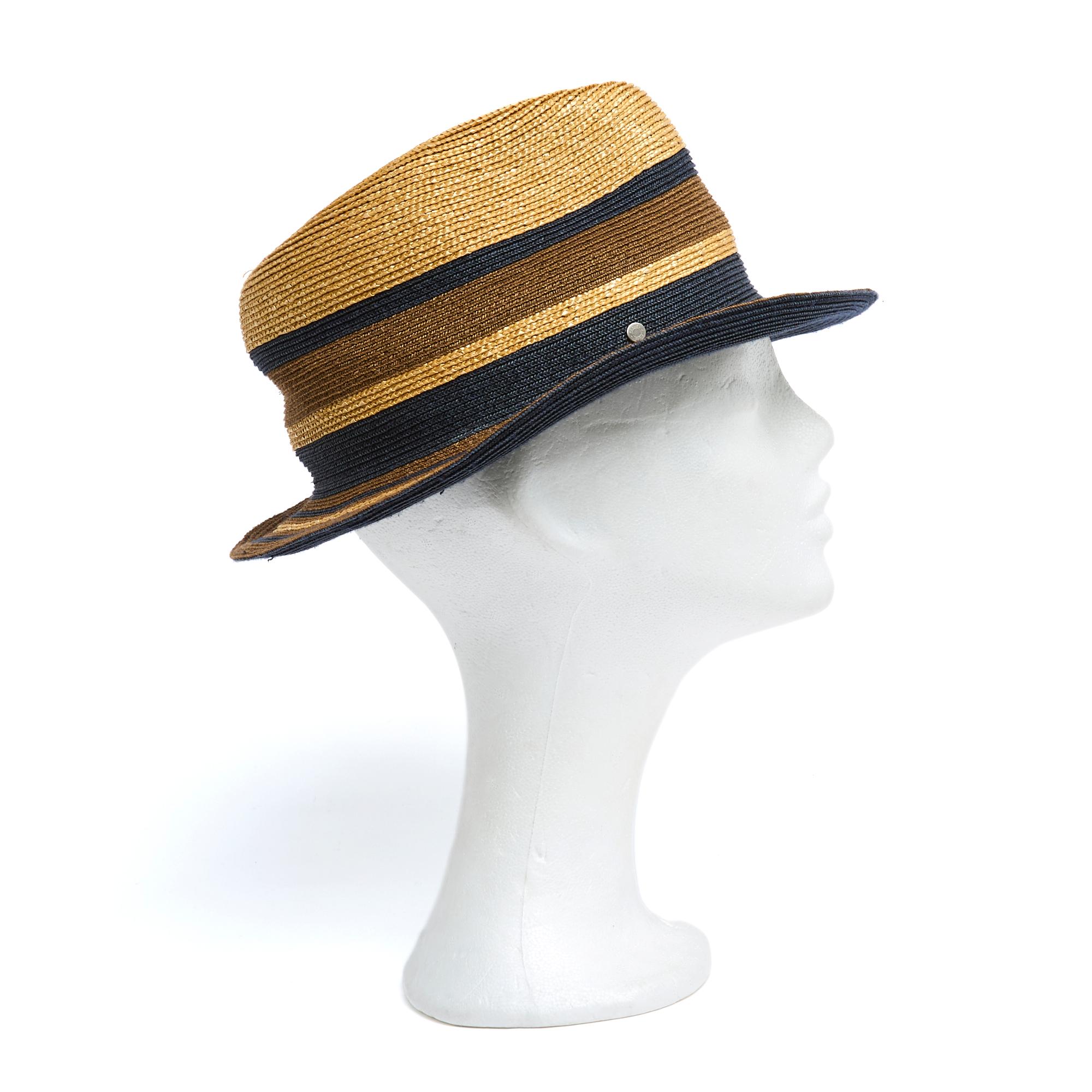 Hermès trilby hat in natural straw, camel and navy blue. Head circumference 57 cm, an international size M. The hat has been worn but is in very good condition, perfect in raw denim and tartan pattern