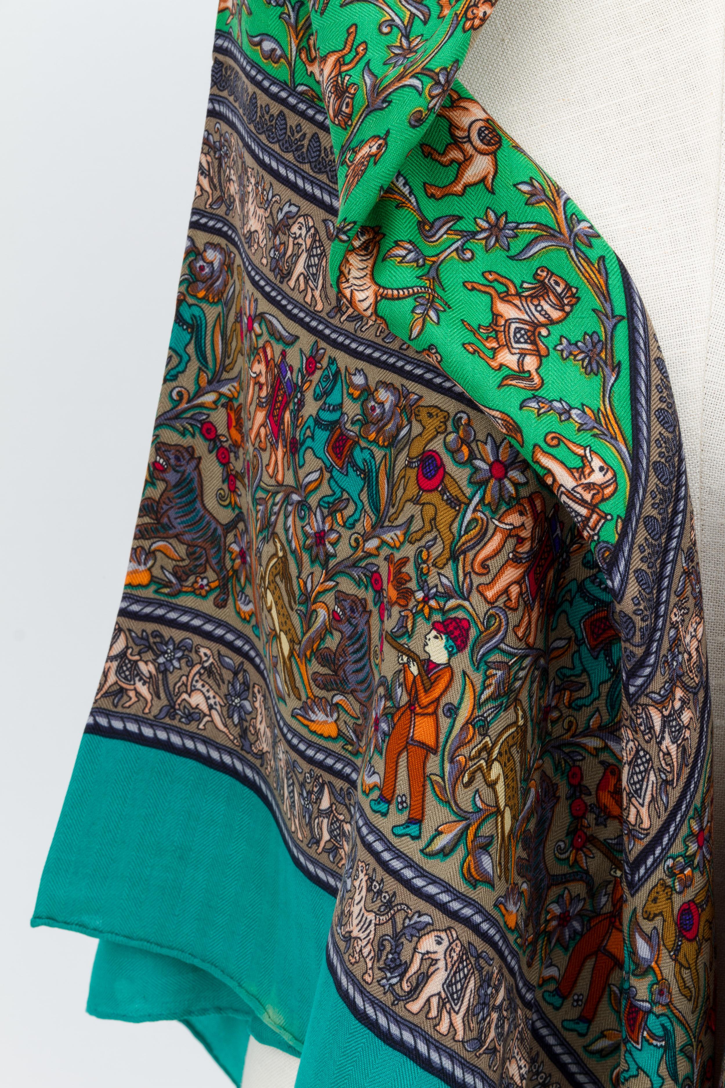 Hermès Chasse en Inde casher shawl, Green and teal color combination . Please refer to photo for fading in one corner .