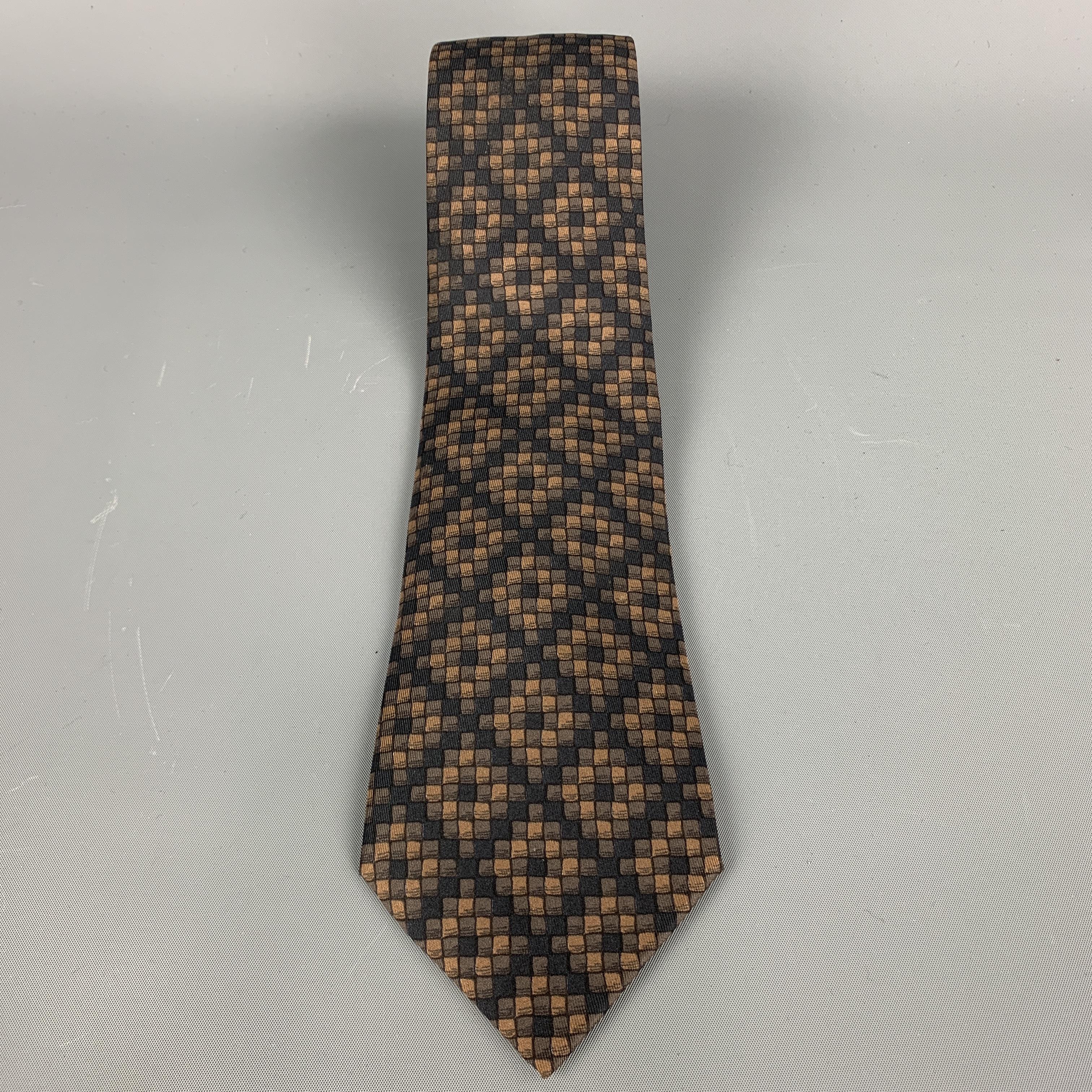 Vintage Hermes necktie comes in black and brown silk twill with all over 