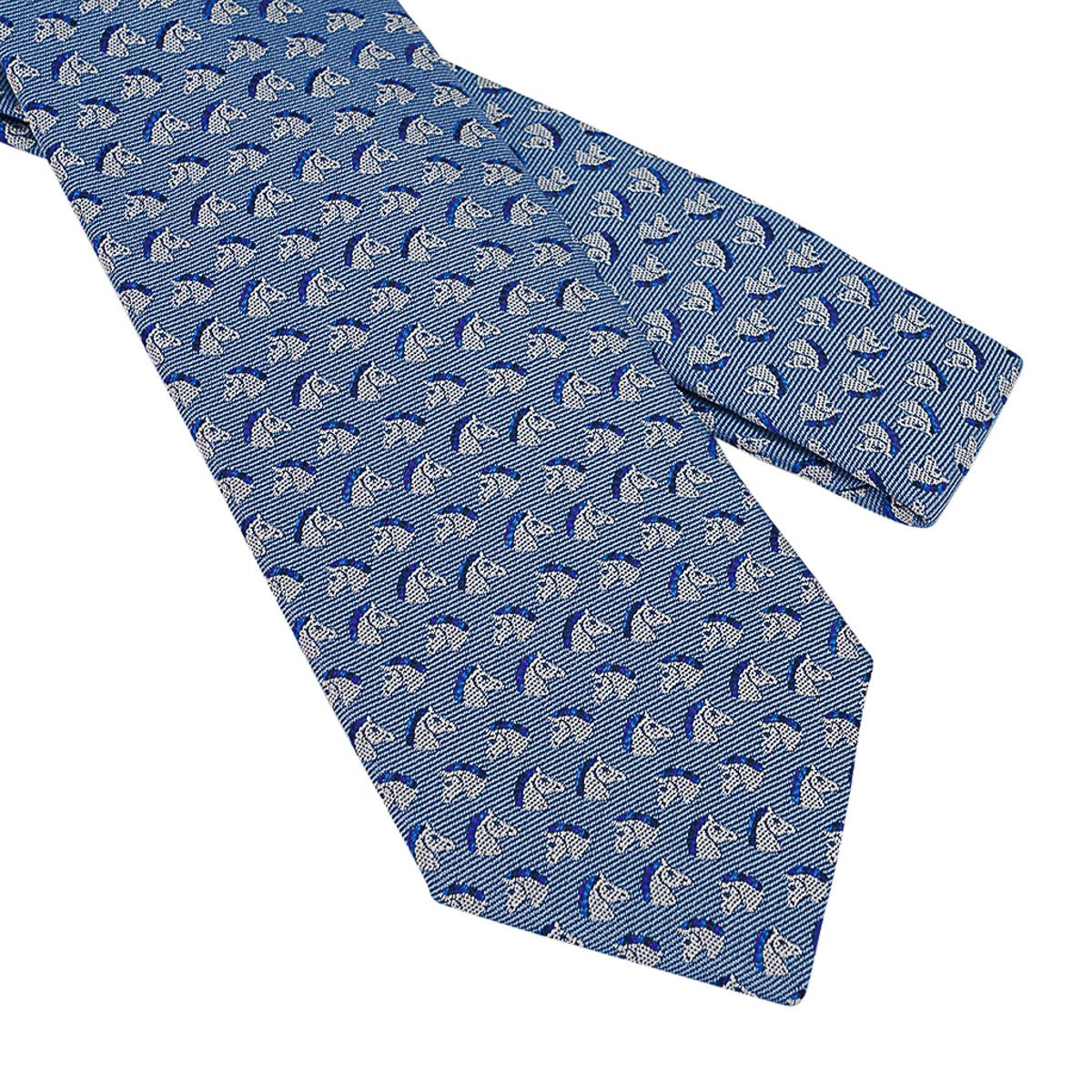 Mightychic offers an Hermes Tie 7 Cheval Rebelle featured in Ciel, Blanc and Marine colorway.
Hand sewn heavy silk twill.
Fun equestrian motif - Punk Mane!
Hand-sewn silk twill.
Made in France
NEW or NEVER WORN.
final sale

TIE MEASURES:
WIDTH 7