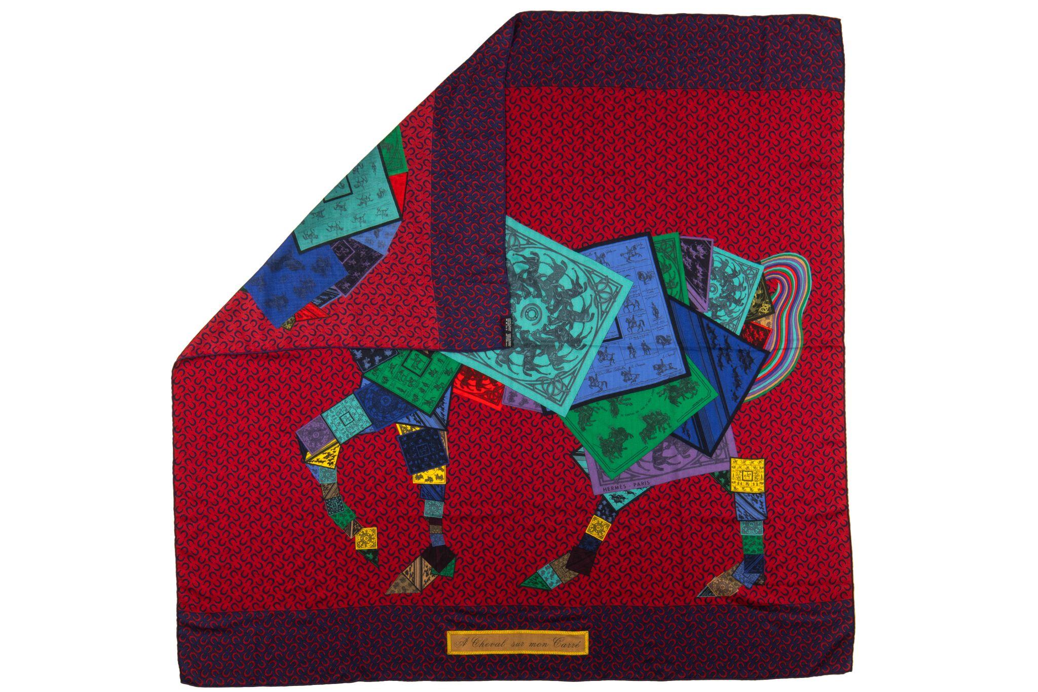 The Hermes Cheval Sur Mon Carre Cashmere/Silk Shawl in multi color and featuring rolled edges, perfect for layering. Comes without box.